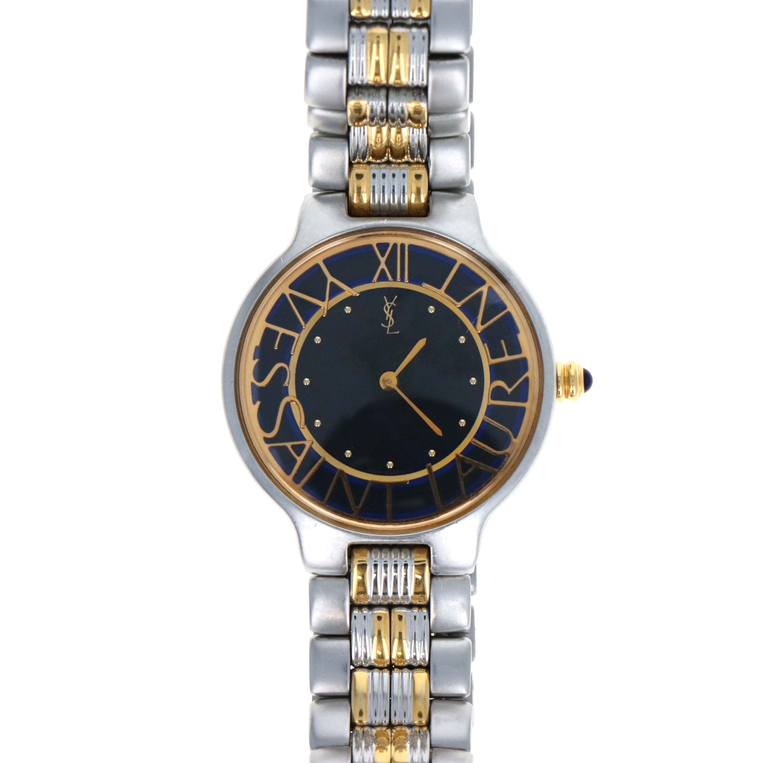 Vintage Yves Saint Laurent Roman Logo Dial - Queen May