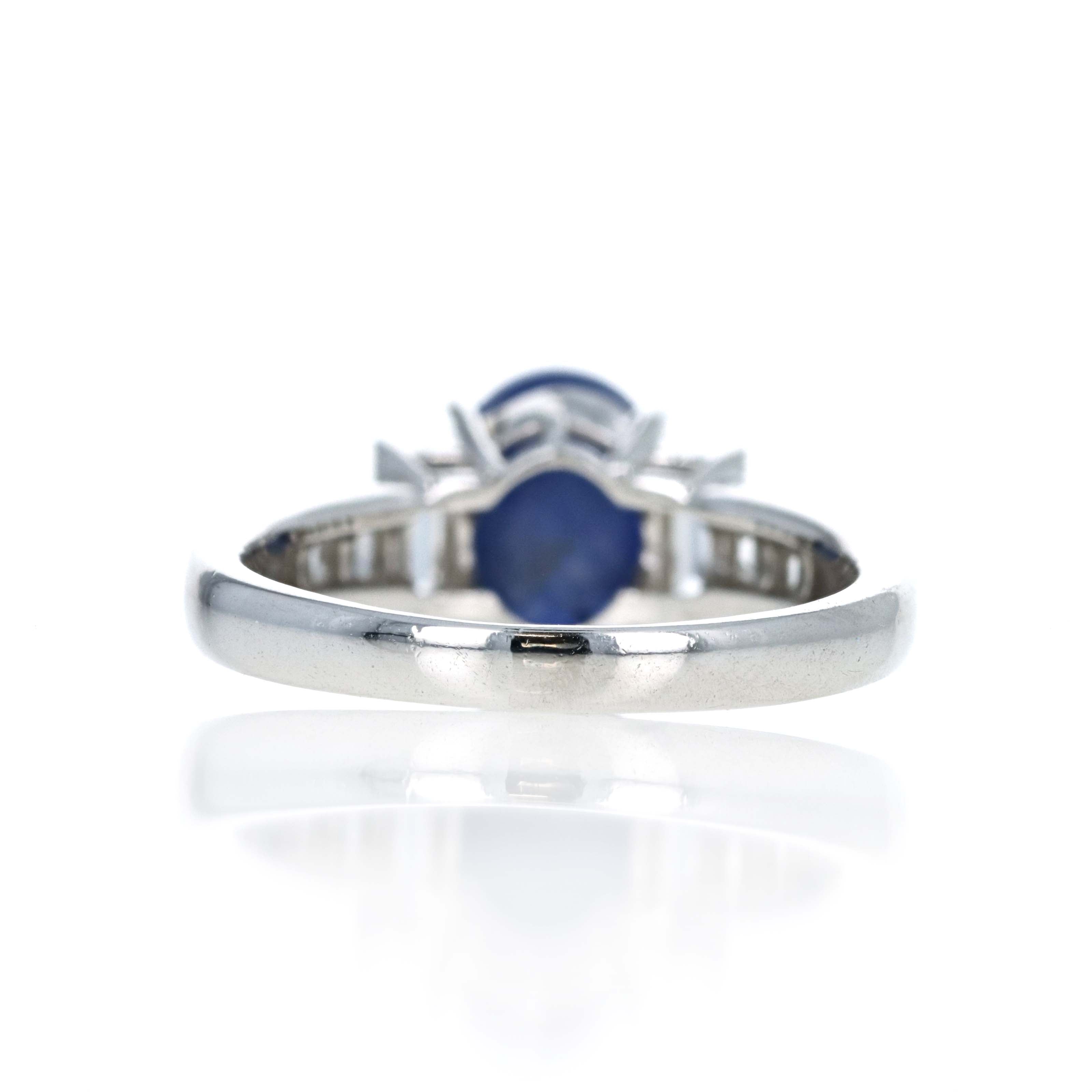 Platinum 3.77 Carat Oval Star Sapphire Diamond Baguette Ring