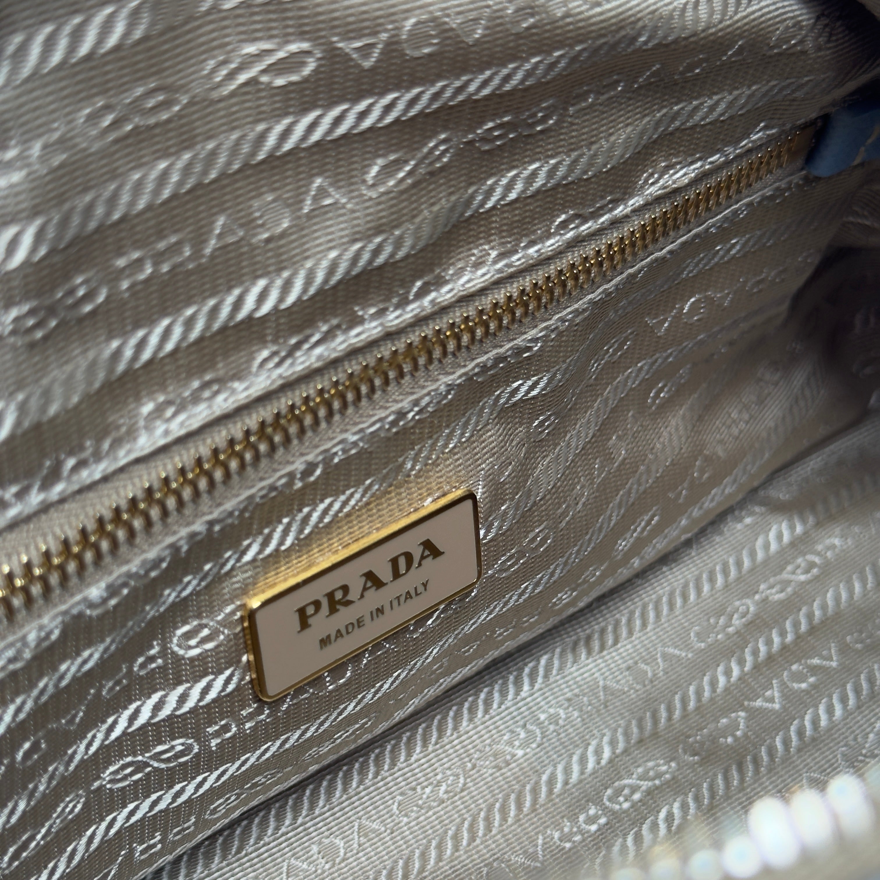 Prada Perforated Saffiano Lux Bauletto Bag Light Blue