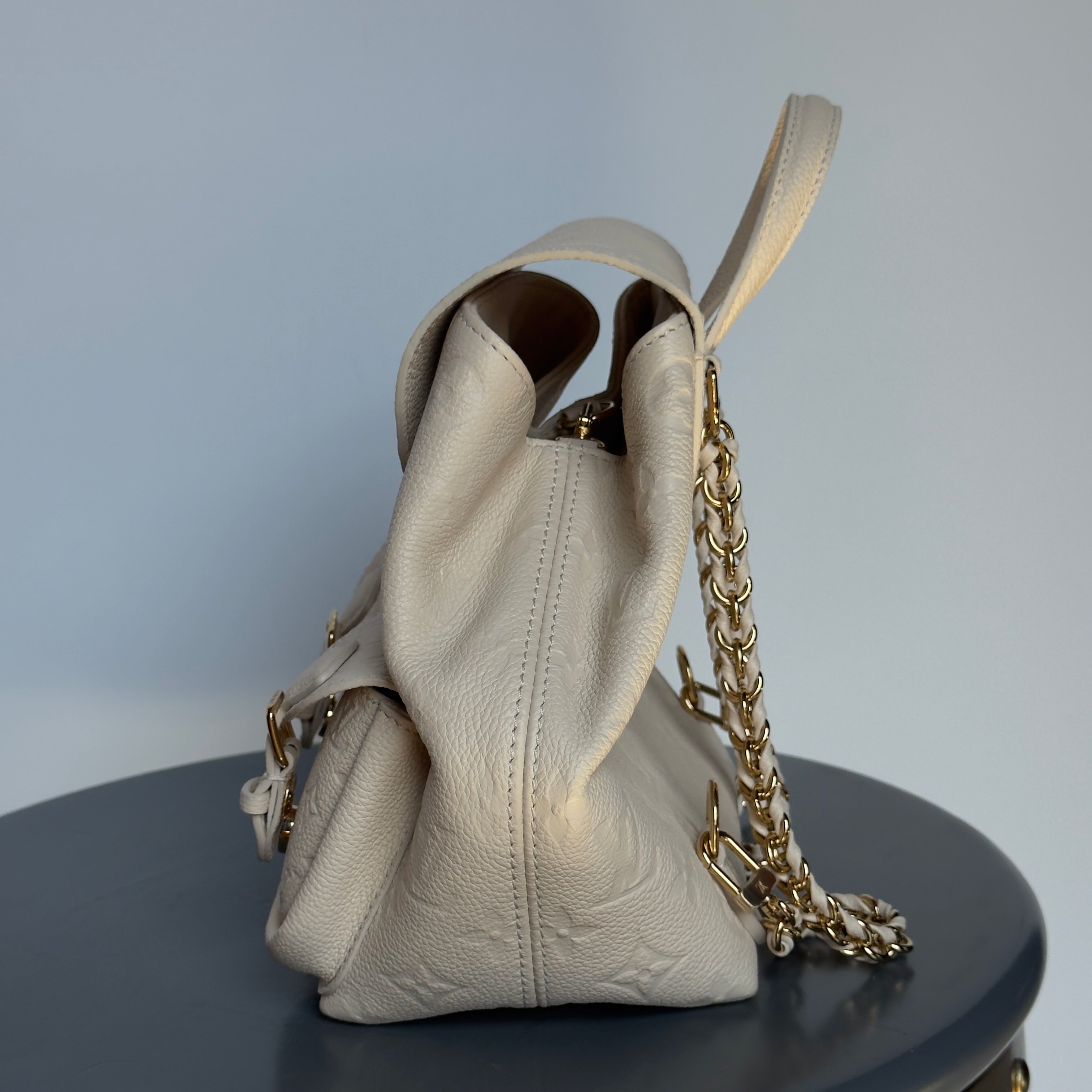 Louis Vuitton Monogram Empreinte Backpack Cream - Queen May