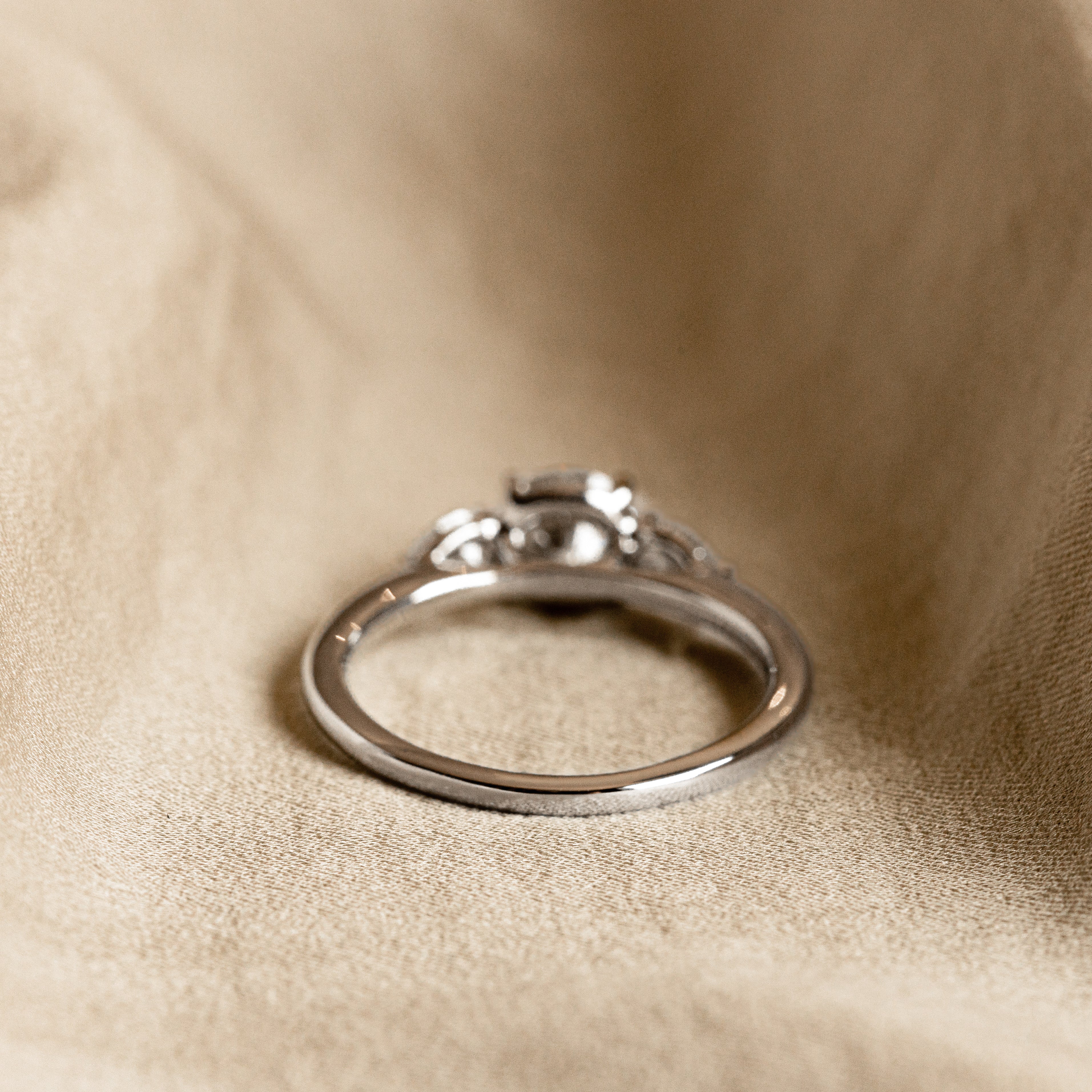 1.04 Carat Round Brilliant Diamond Three Stone Pear Accent Engagement Ring in Platinum - Queen May