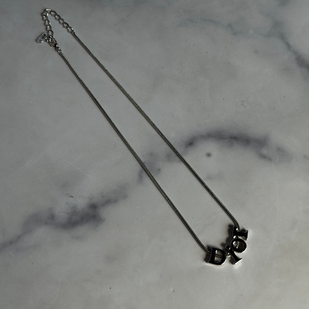 Christian Dior Silver Tone Spell Out Necklace - Queen May