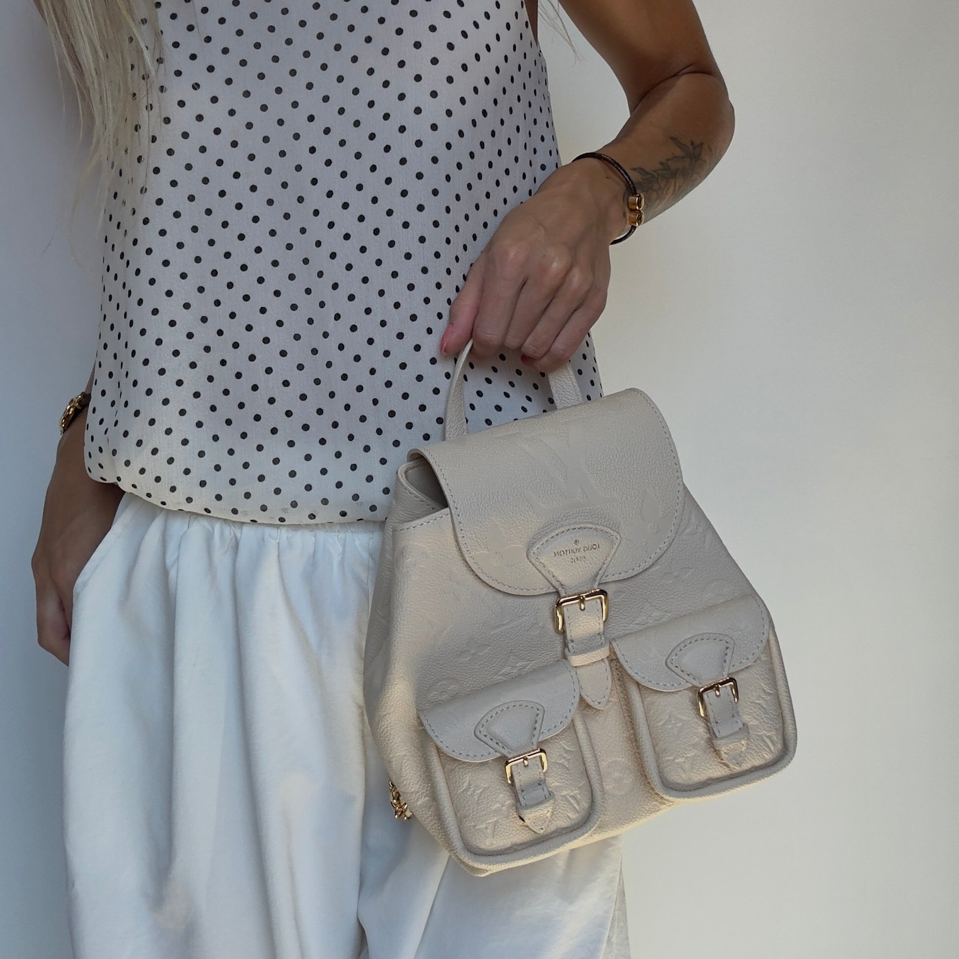 Louis Vuitton Monogram Empreinte Backpack Cream - Queen May