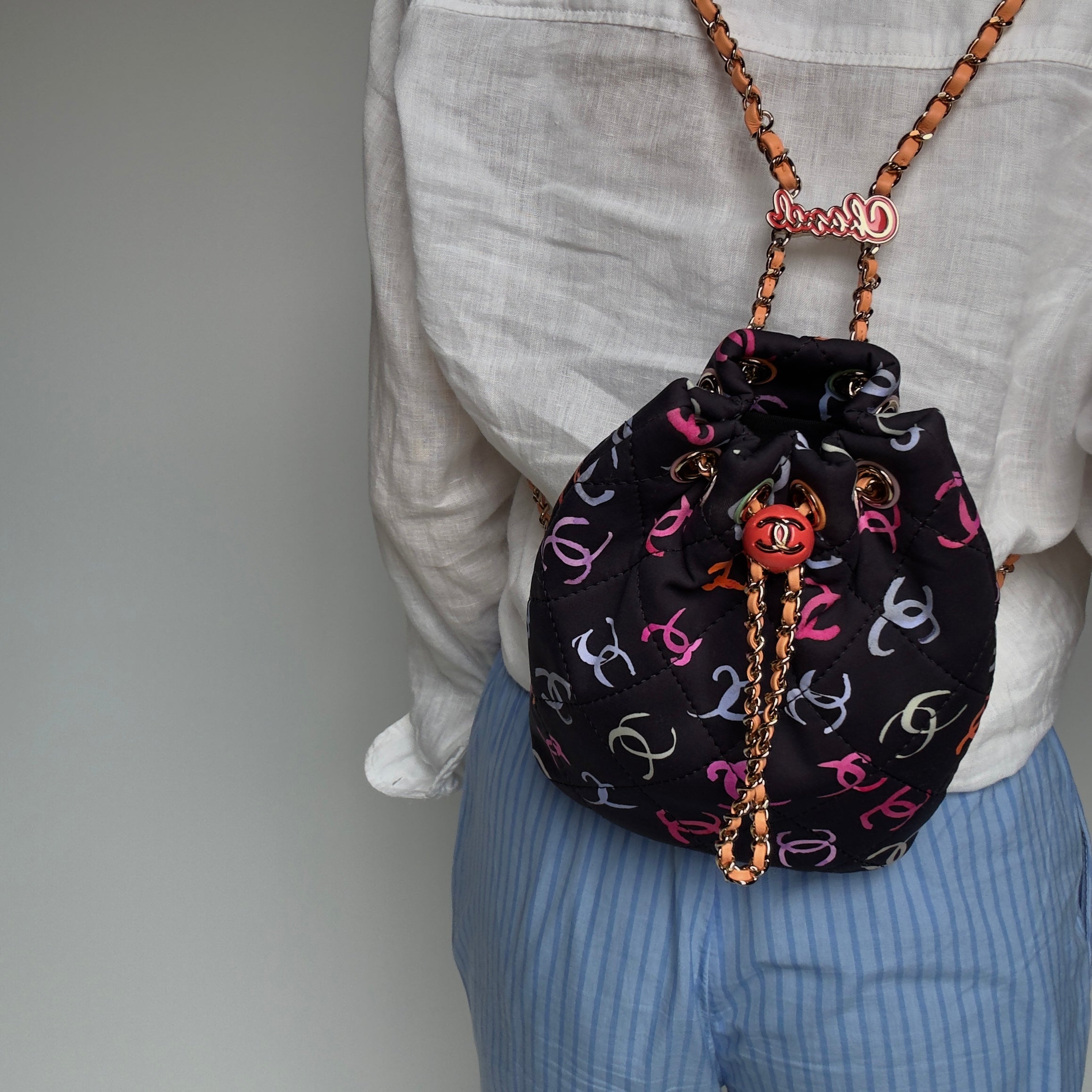 Chanel Medium CC Drawstring Backpack Multicolored Printed Fabric Light Gold Hardware