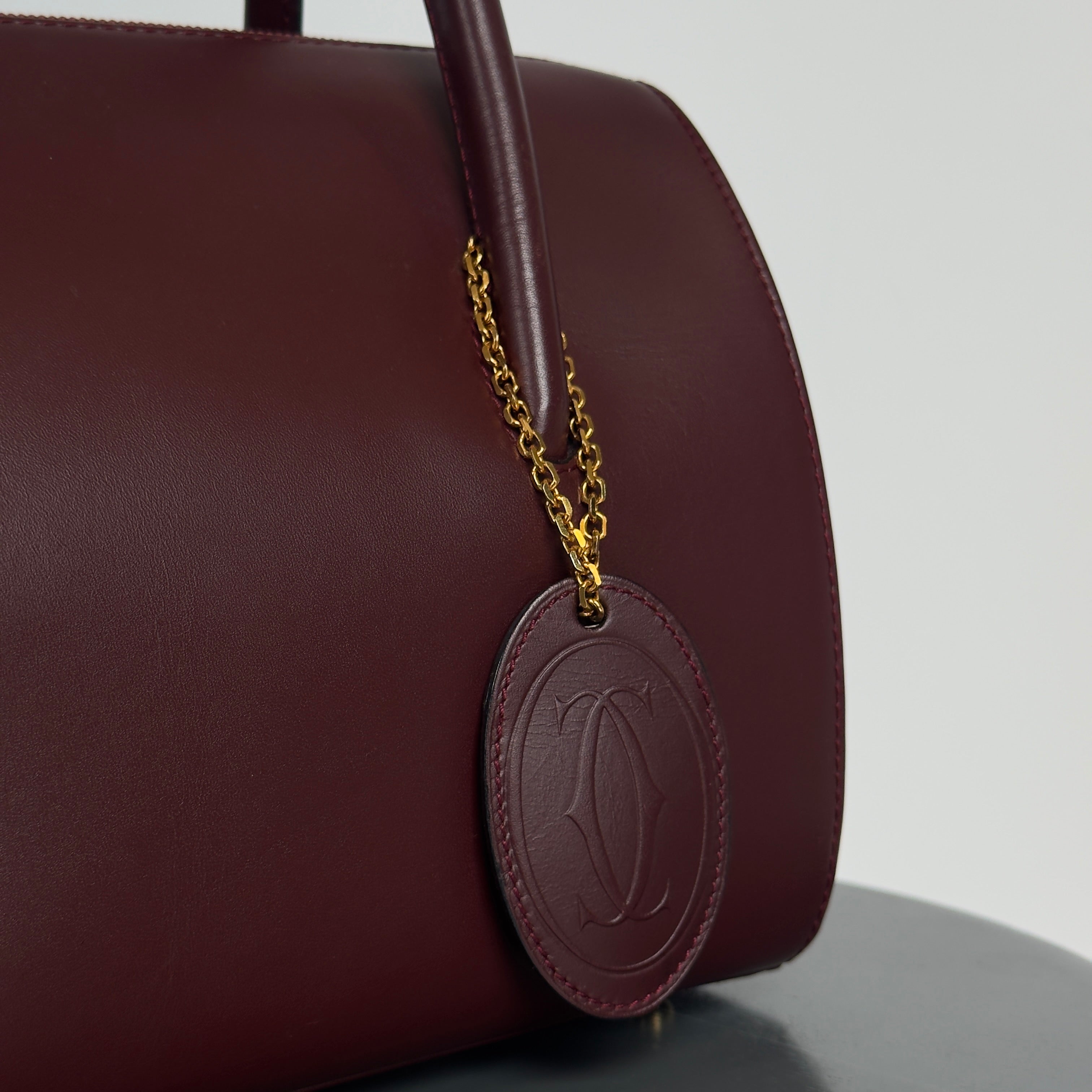 Cartier Must De Cartier Leather Bordeaux Boston Bag - Queen May