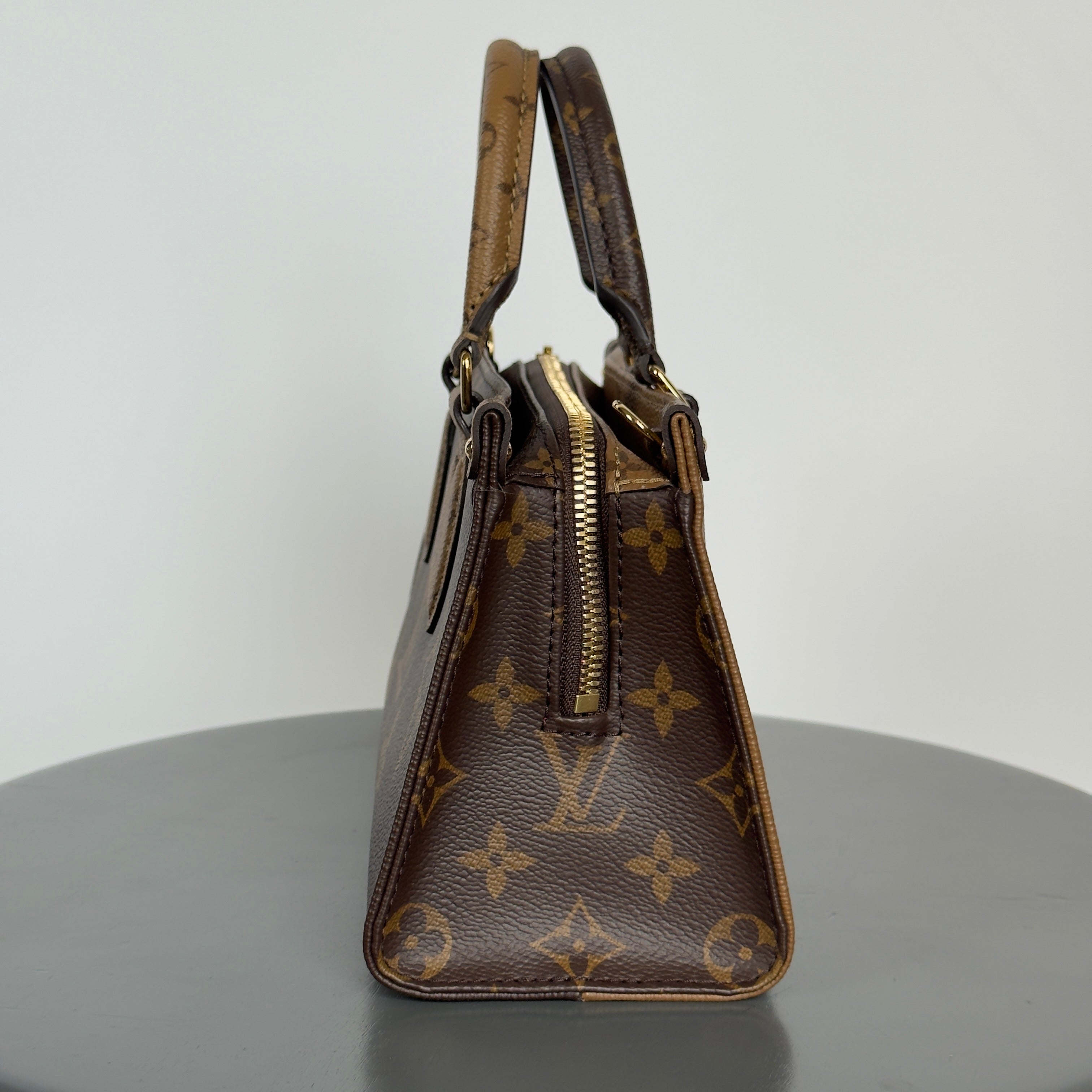 Louis Vuitton Monogram On The Go East To West - Queen May