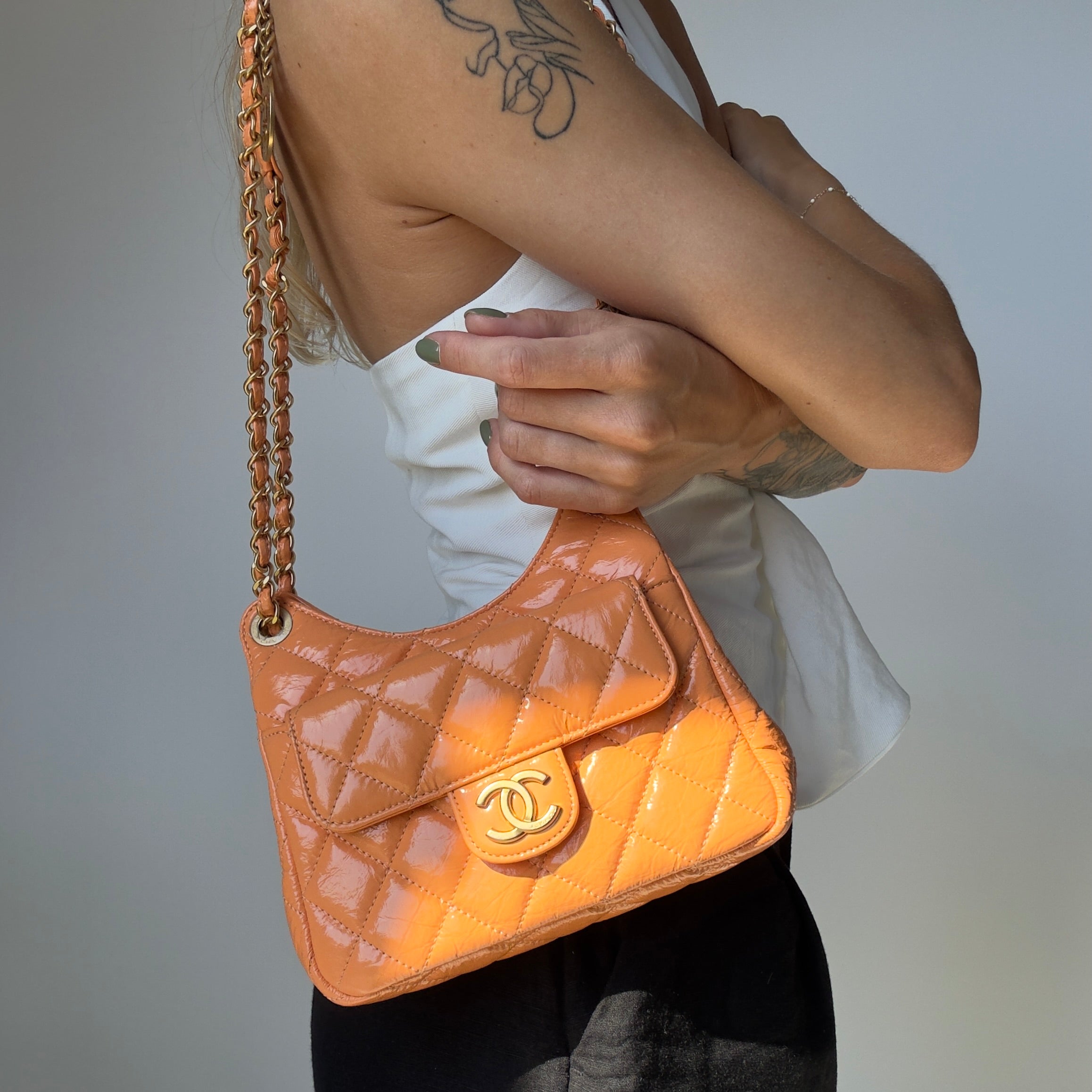 Chanel Orange Shiny Crumpled Quilted Leather Small Wavy CC Hobo 2023 - Queen May