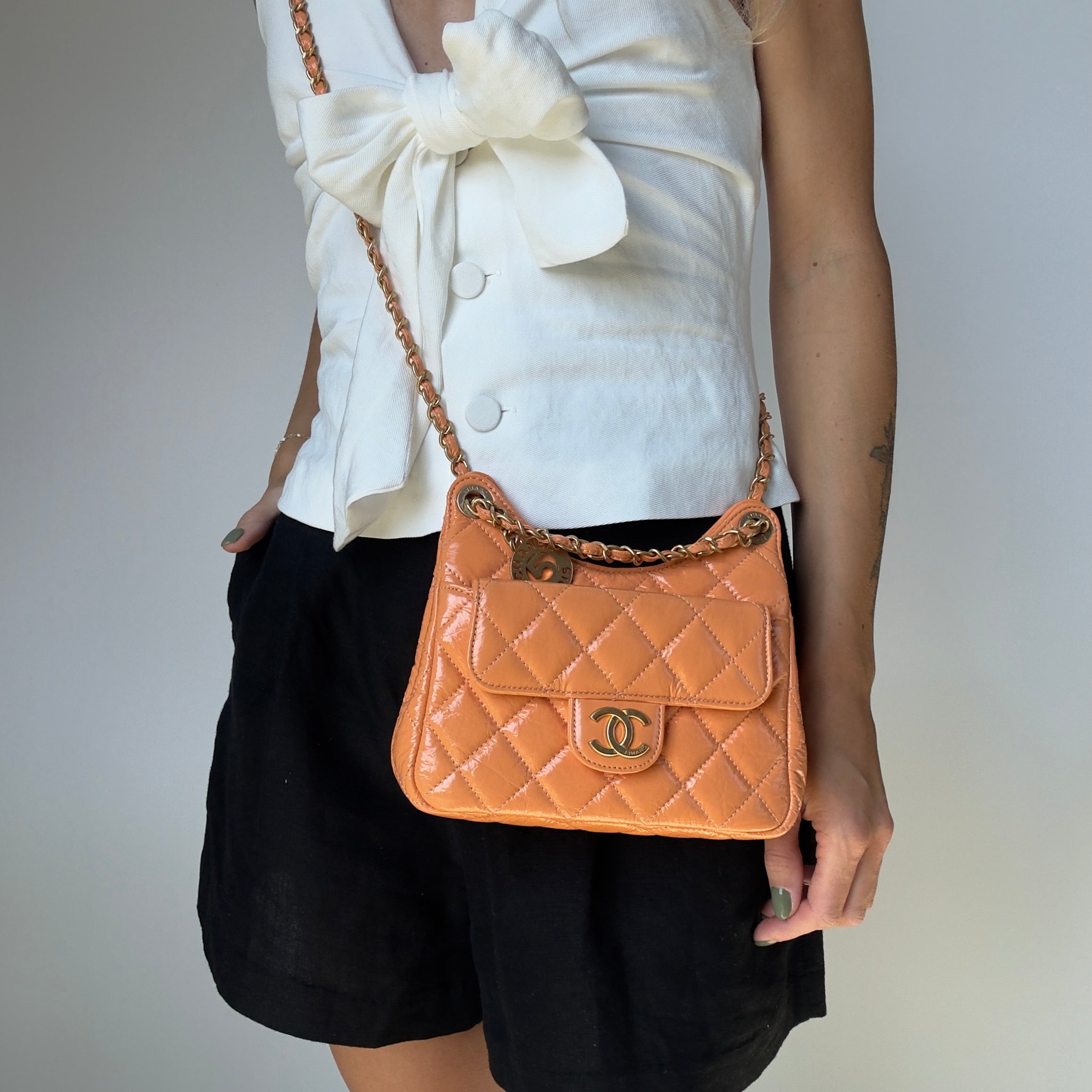 Chanel Orange Shiny Crumpled Quilted Leather Small Wavy CC Hobo 2023 - Queen May