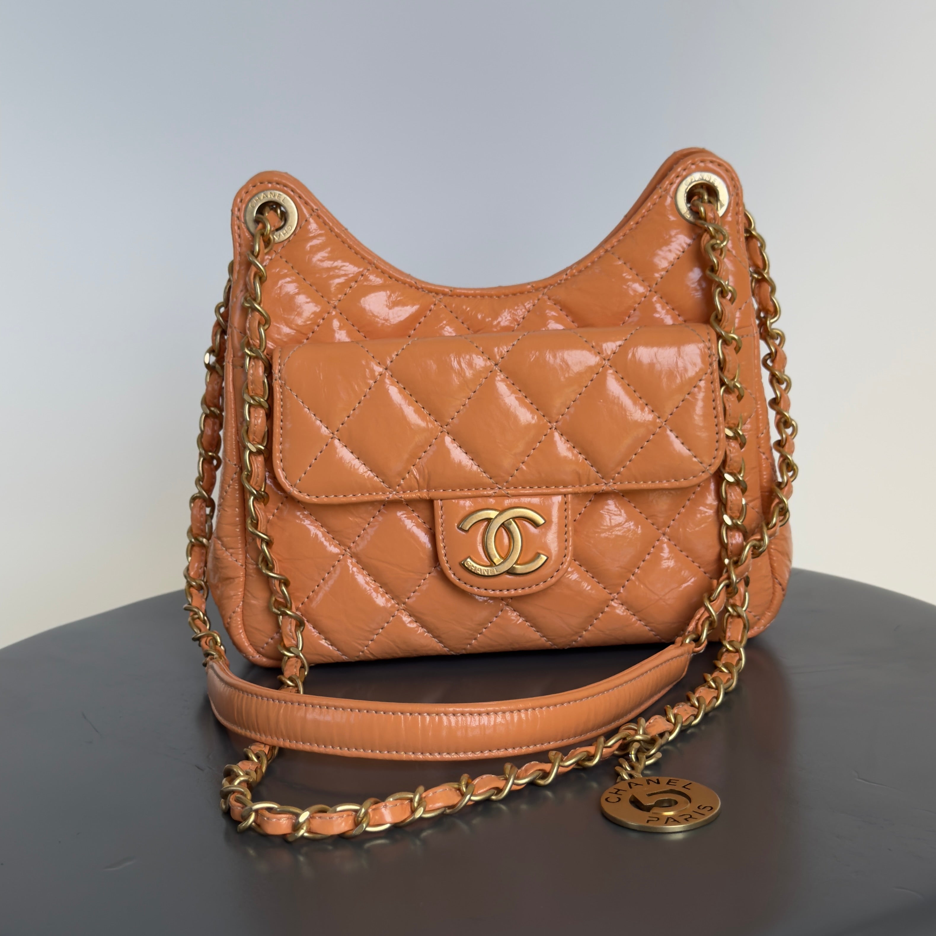 Chanel Orange Shiny Crumpled Quilted Leather Small Wavy CC Hobo 2023 - Queen May