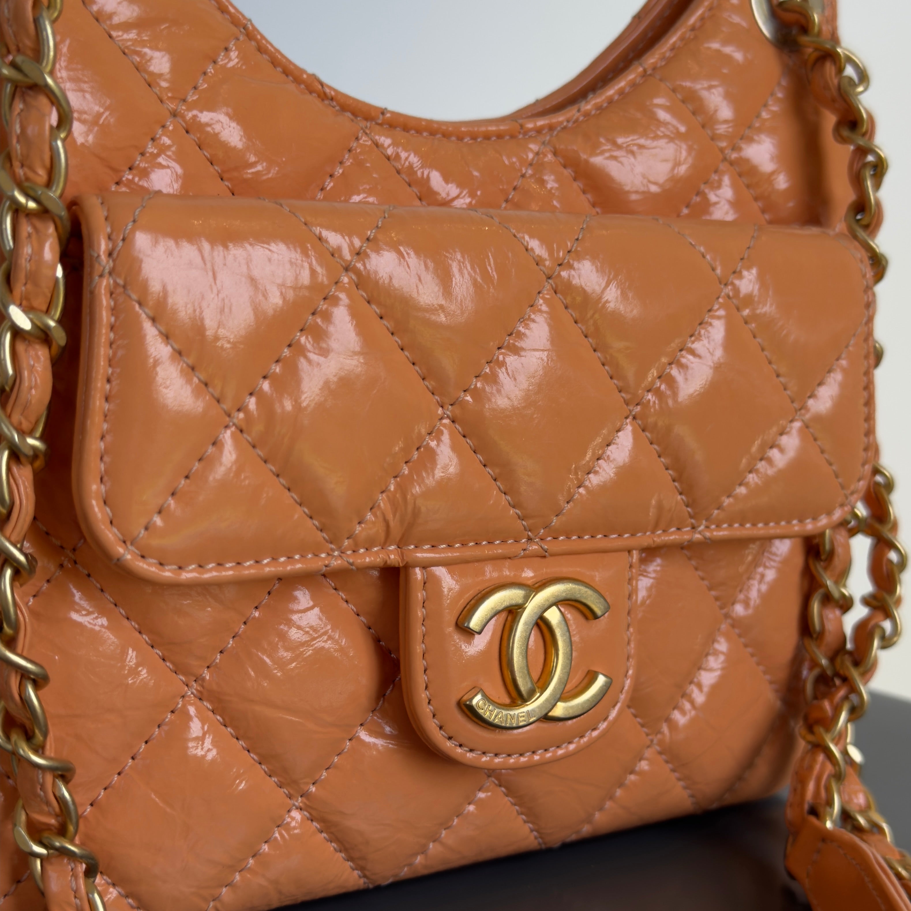 Chanel Orange Shiny Crumpled Quilted Leather Small Wavy CC Hobo 2023 - Queen May