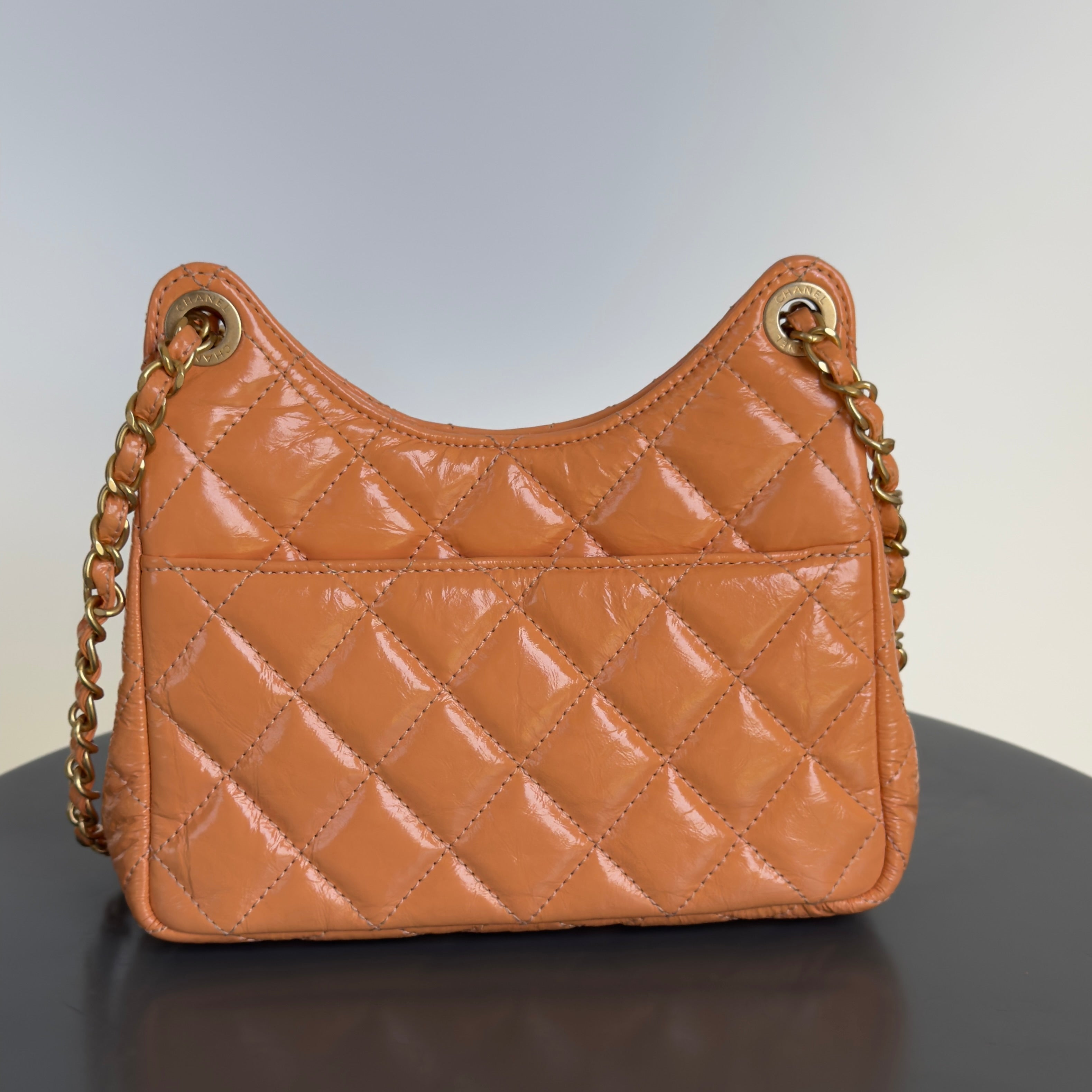 Chanel Orange Shiny Crumpled Quilted Leather Small Wavy CC Hobo 2023 - Queen May