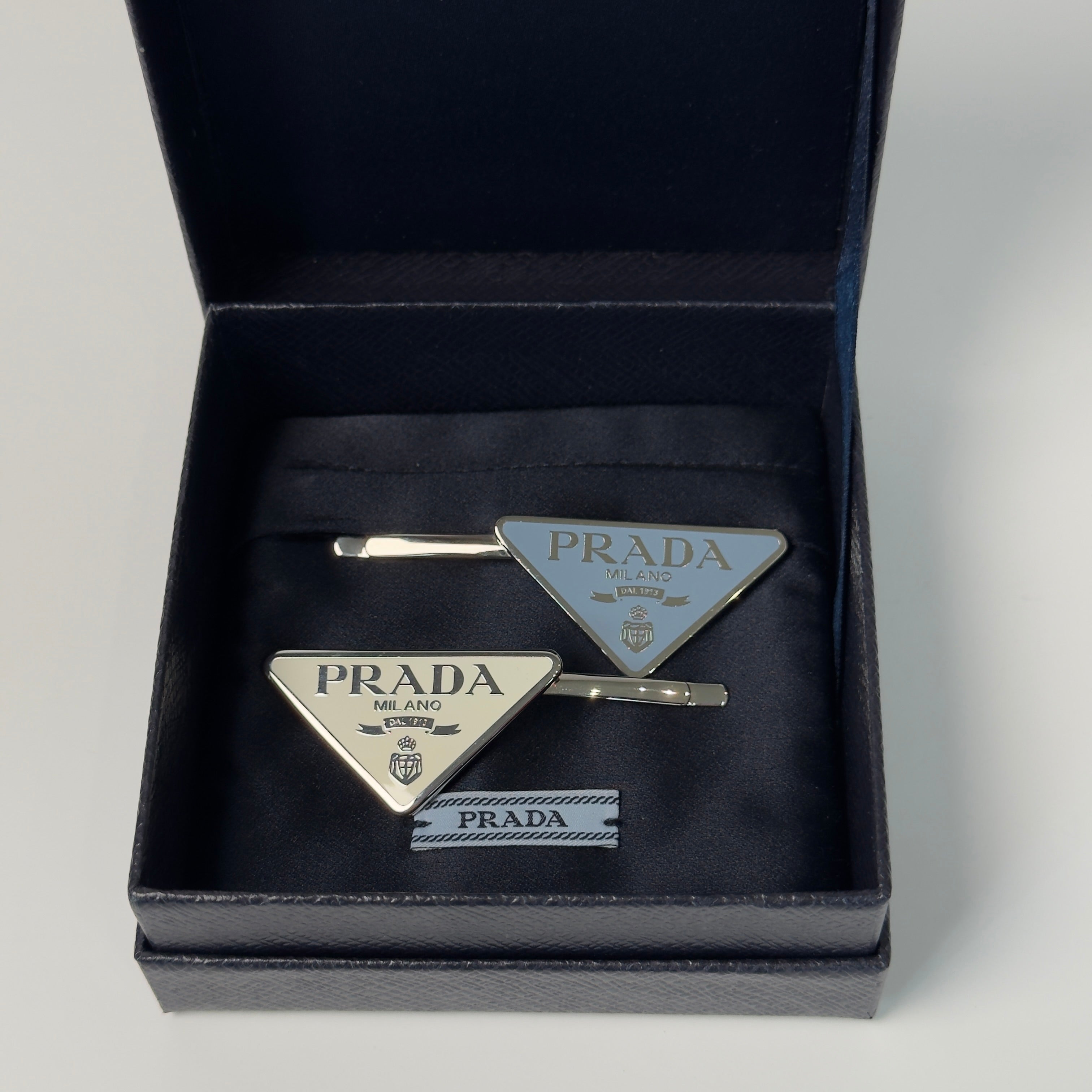 Prada Enamel Triangle Logo Hair Clips - Queen May