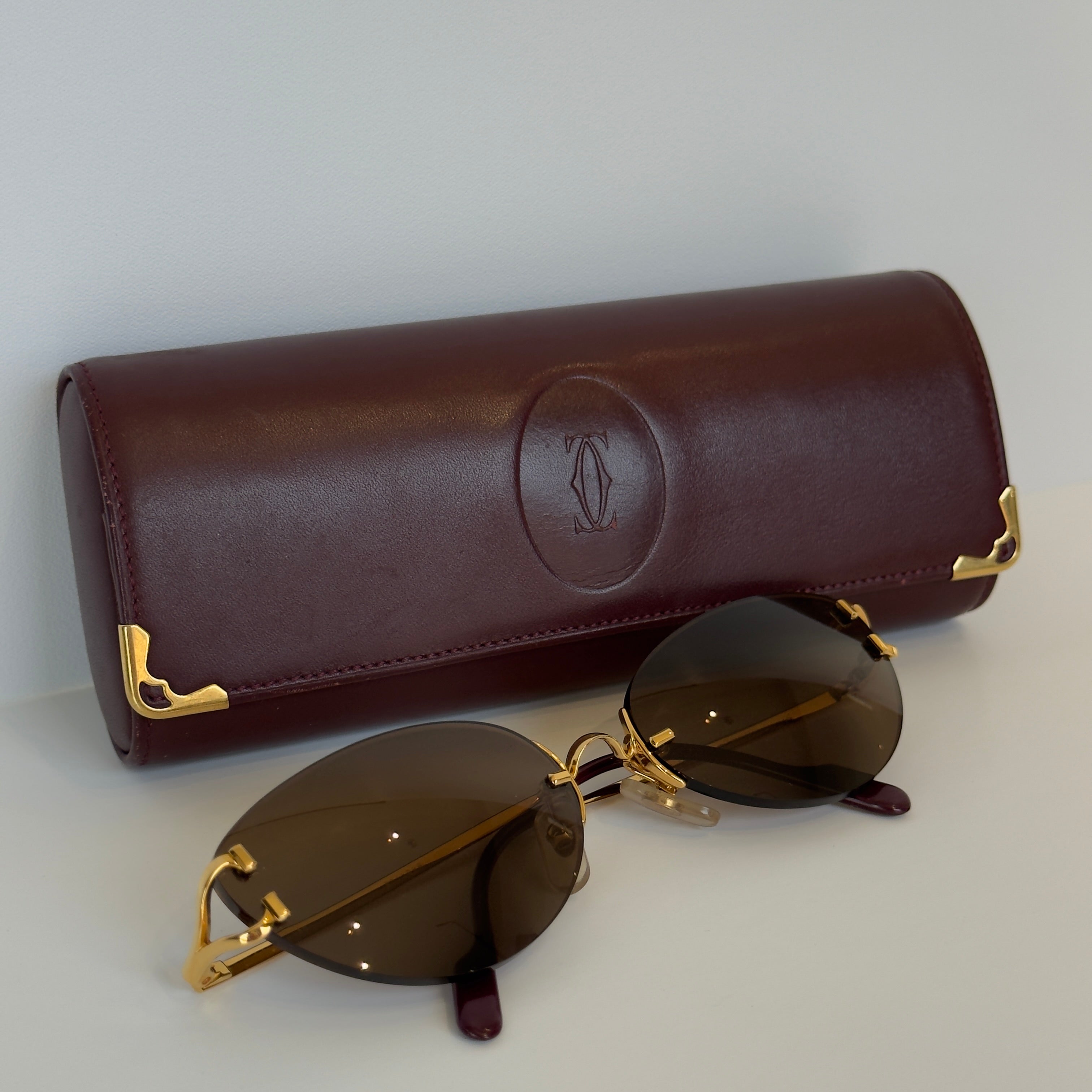 Cartier Oval Rimless Sunglasses Brown - Queen May