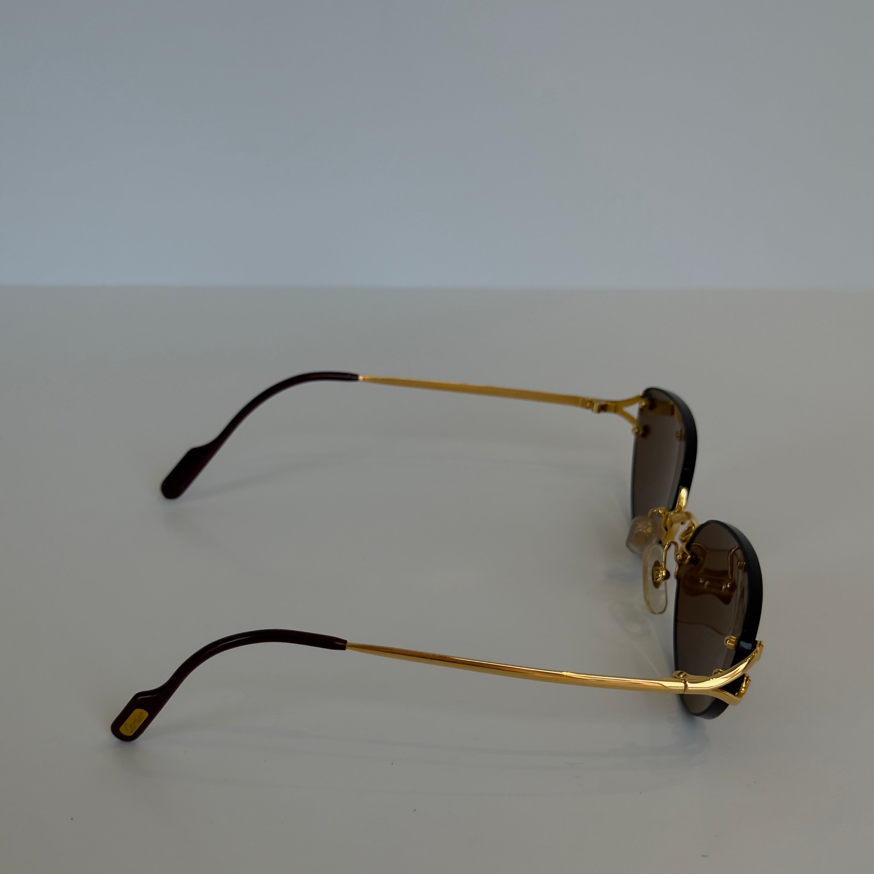 Cartier Oval Rimless Sunglasses Brown - Queen May