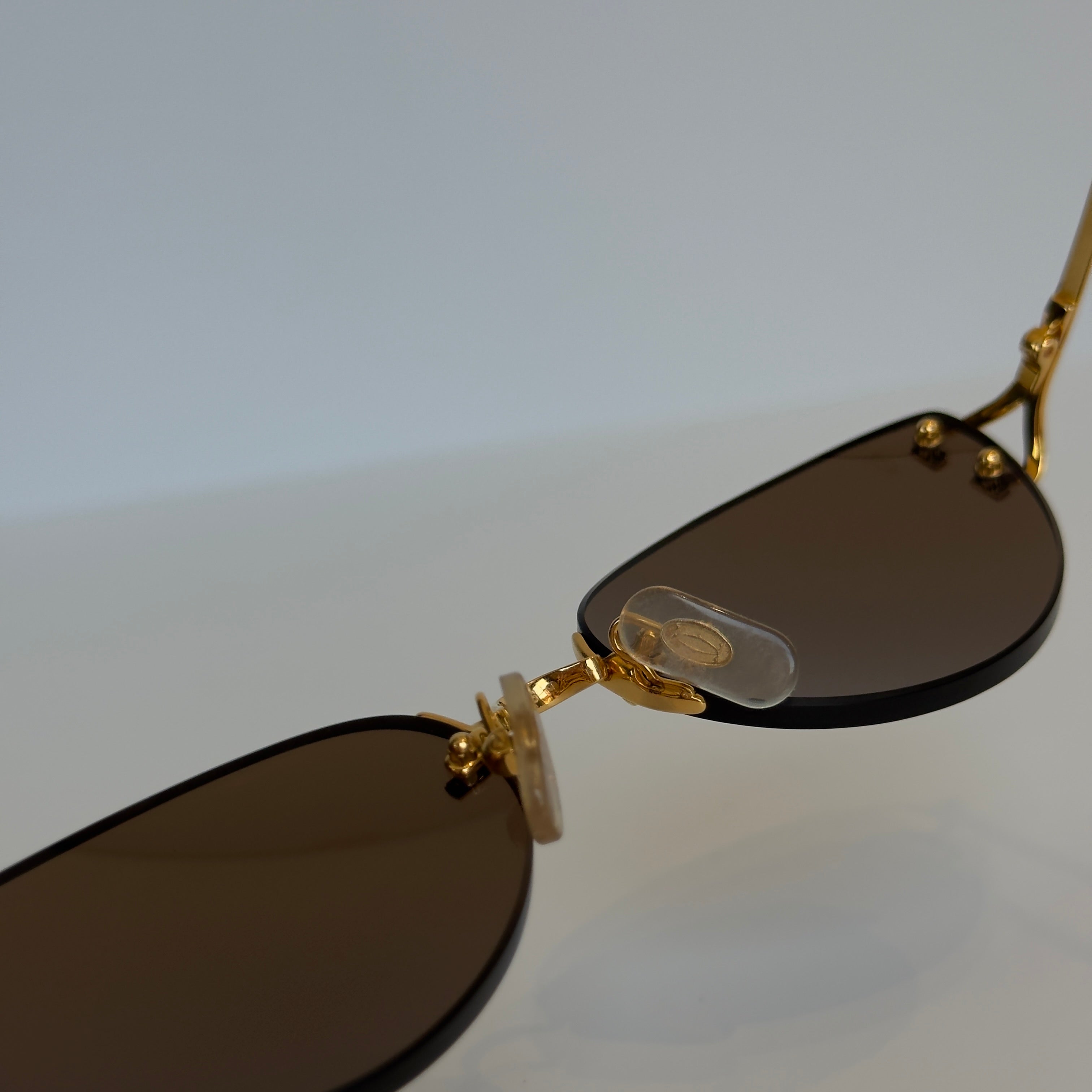 Cartier Oval Rimless Sunglasses Brown - Queen May