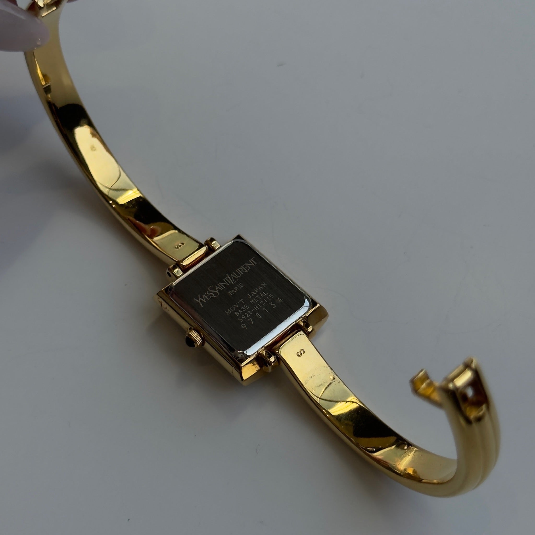 Yves Saint Laurent Champagne Logo Dial Watch - Queen May