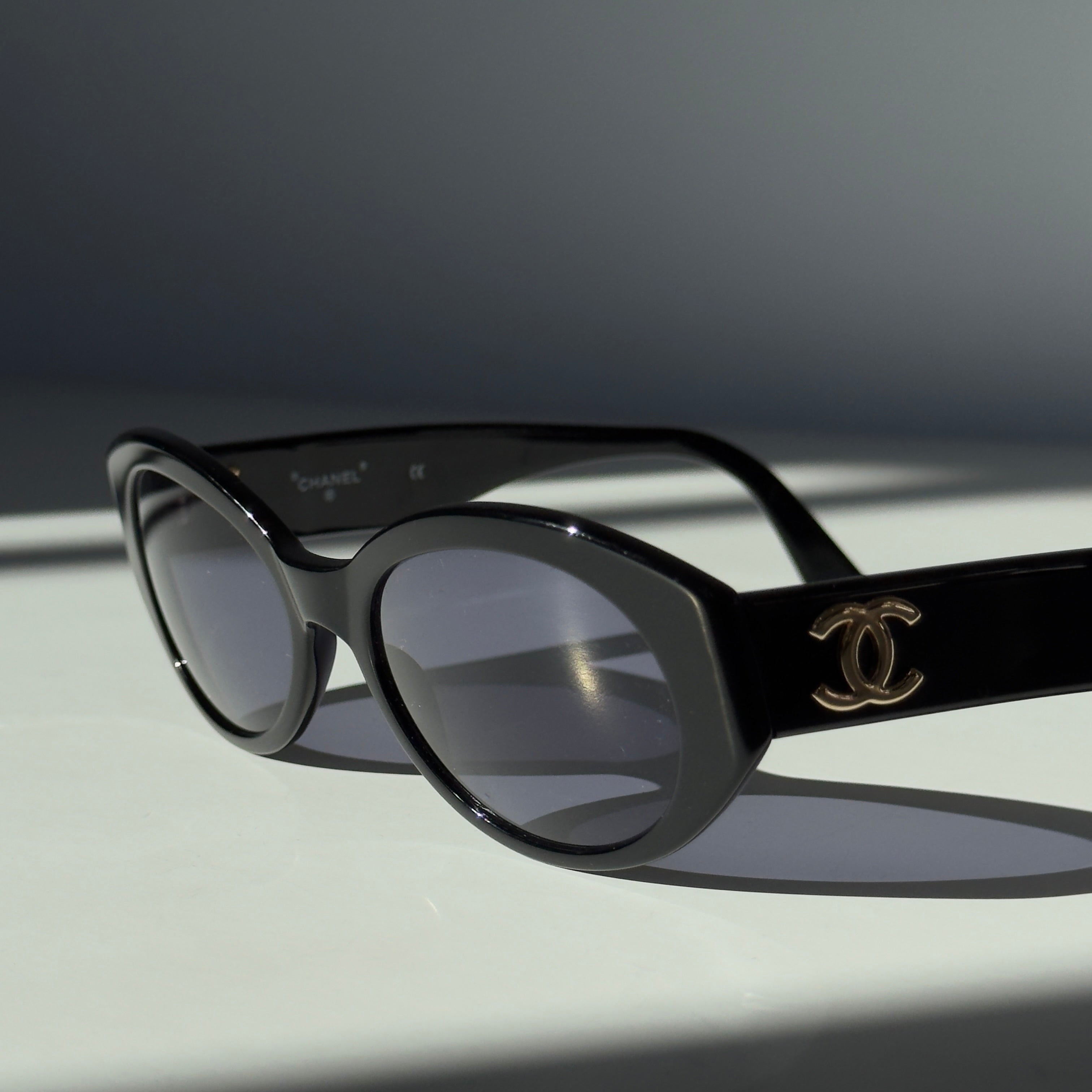 Chanel Oval Black CC Logo Sunglasses - Queen May