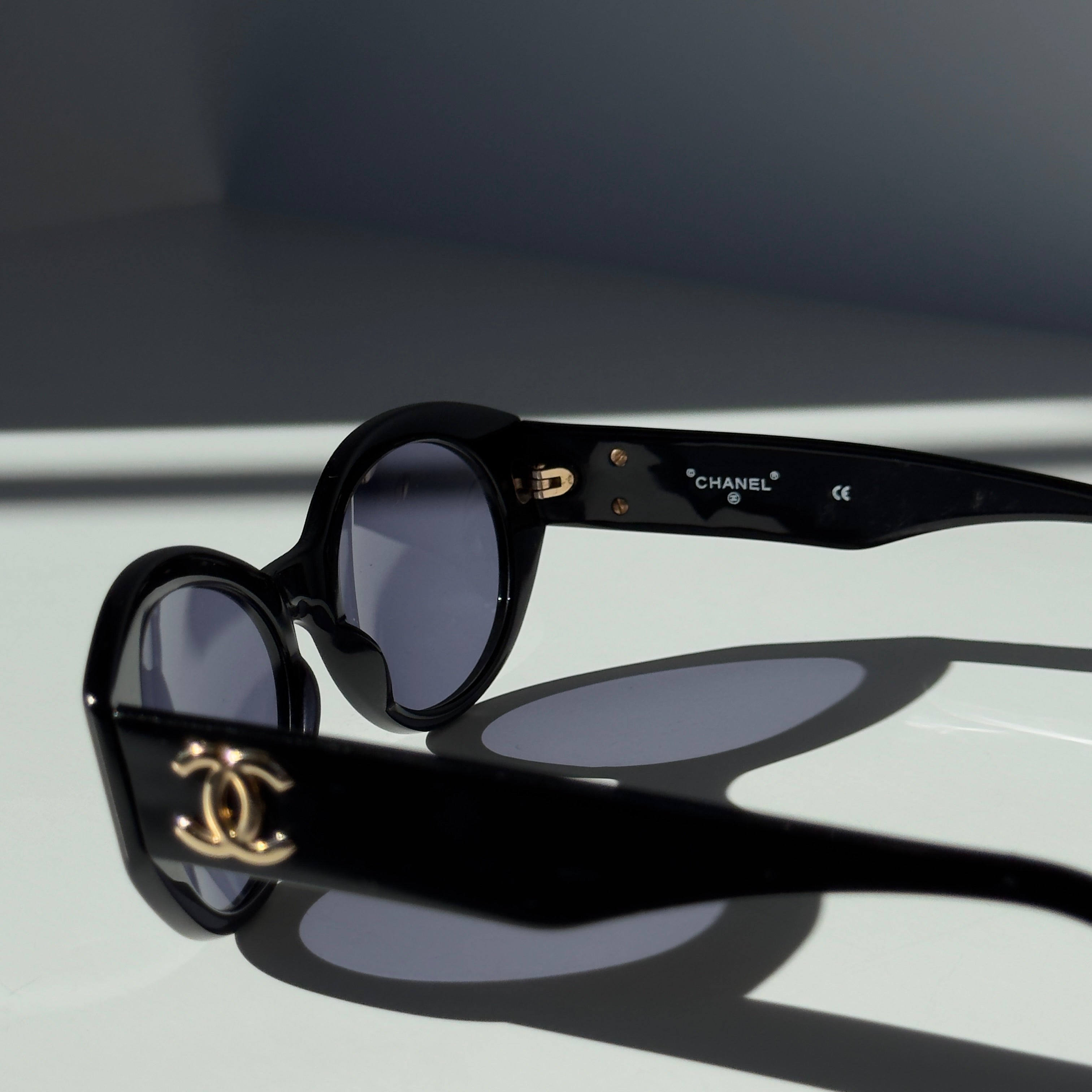 Chanel Oval Black CC Logo Sunglasses - Queen May