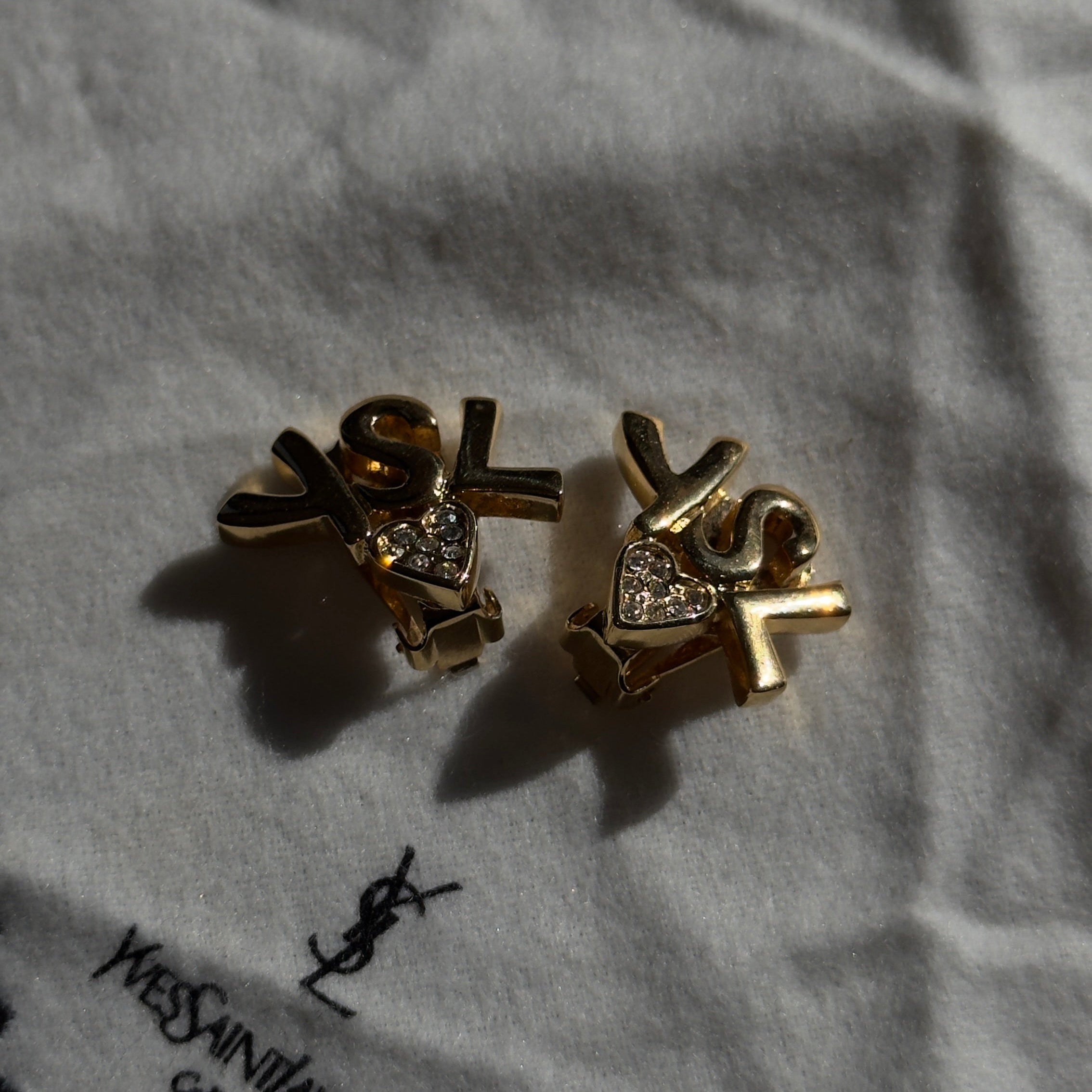 Yves Saint Laurent Vintage YSL Logo Heart Rhinestone Gold Tone Clip On Earrings - Queen May