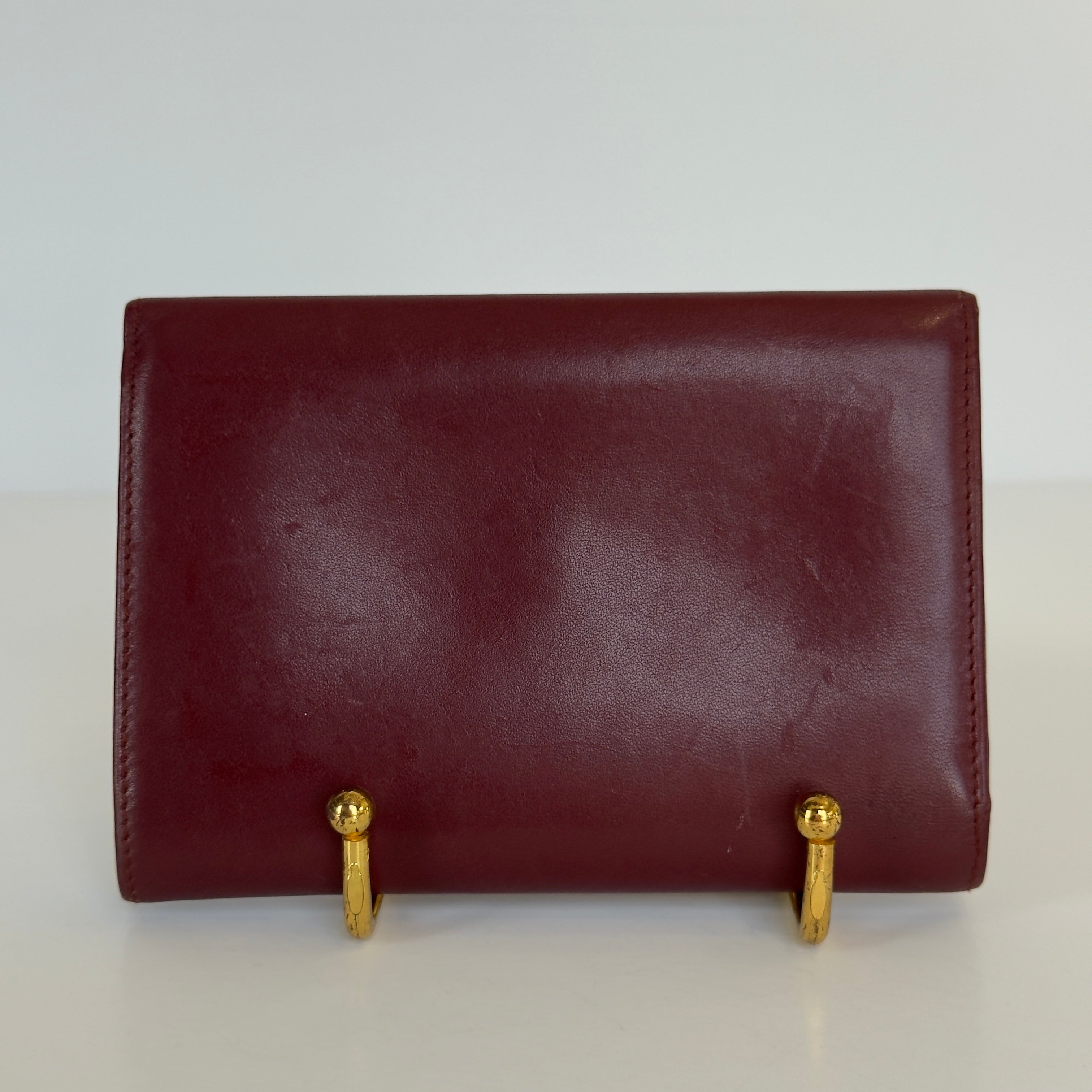 Cartier Paris Logo Kiss Lock Burgundy Tri Fold Wallet - Queen May