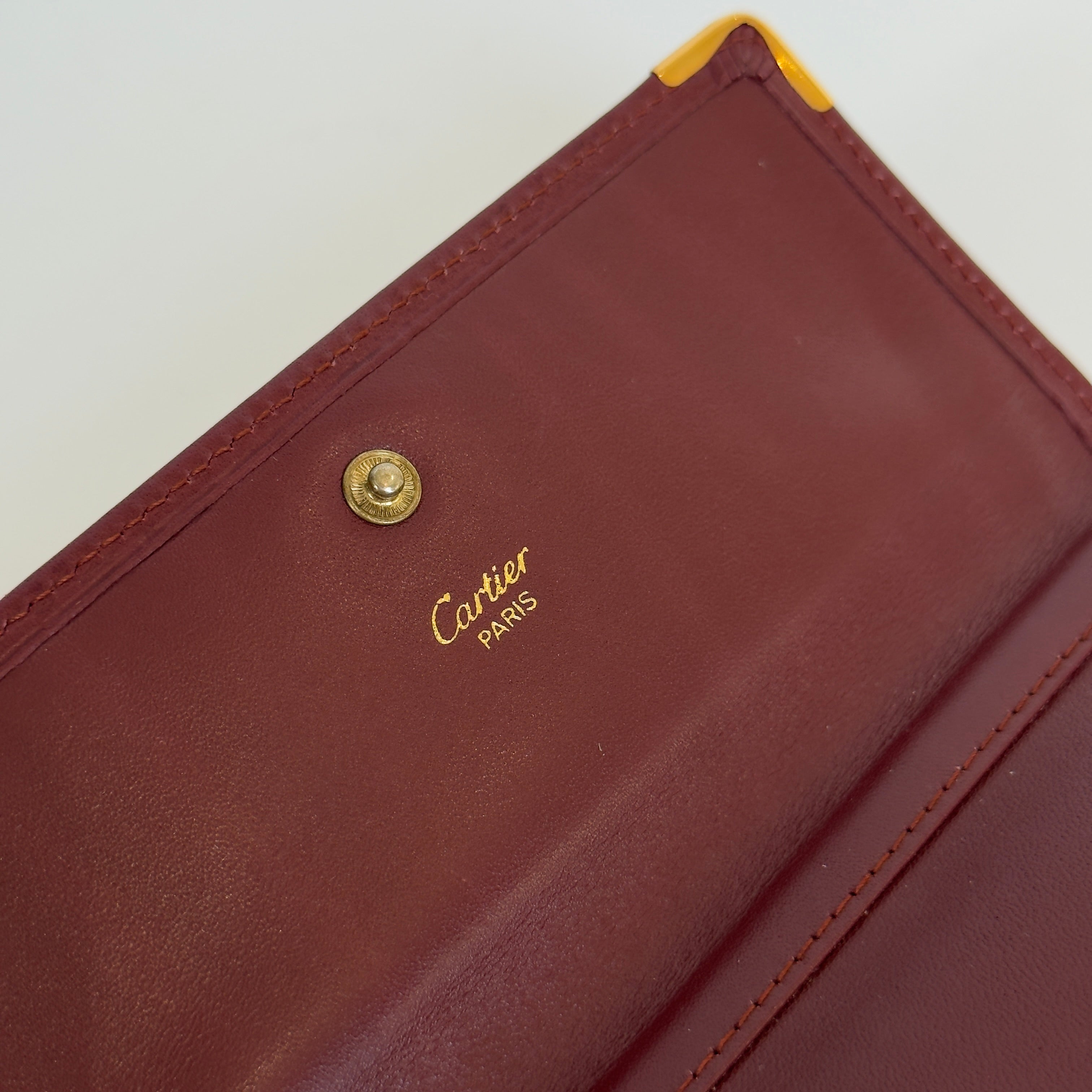 Cartier Paris Logo Kiss Lock Burgundy Tri Fold Wallet - Queen May