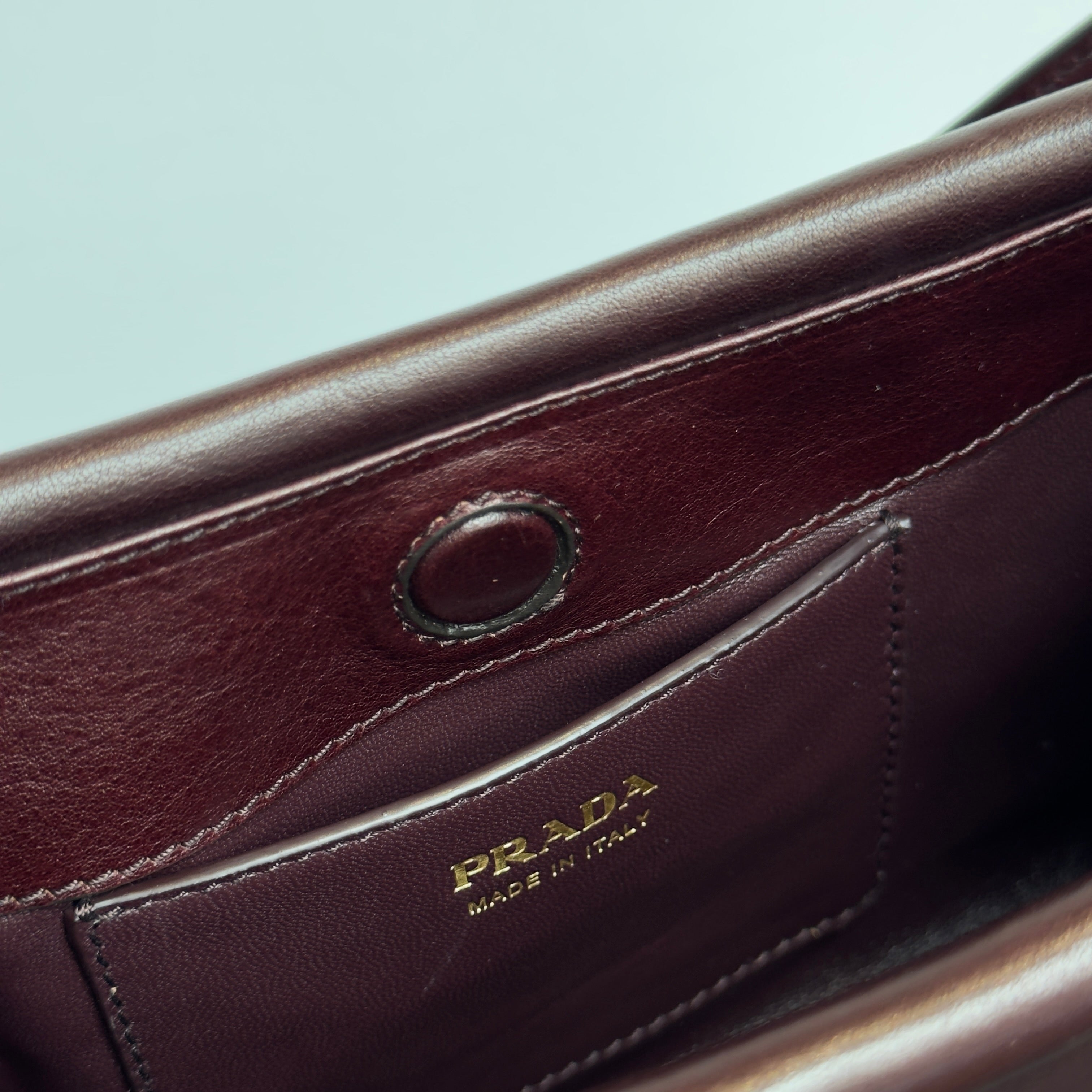 Ultra Rare Prada Fall 2025 Slouchy Burgundy Half Moon Shoulder Bag - Queen May