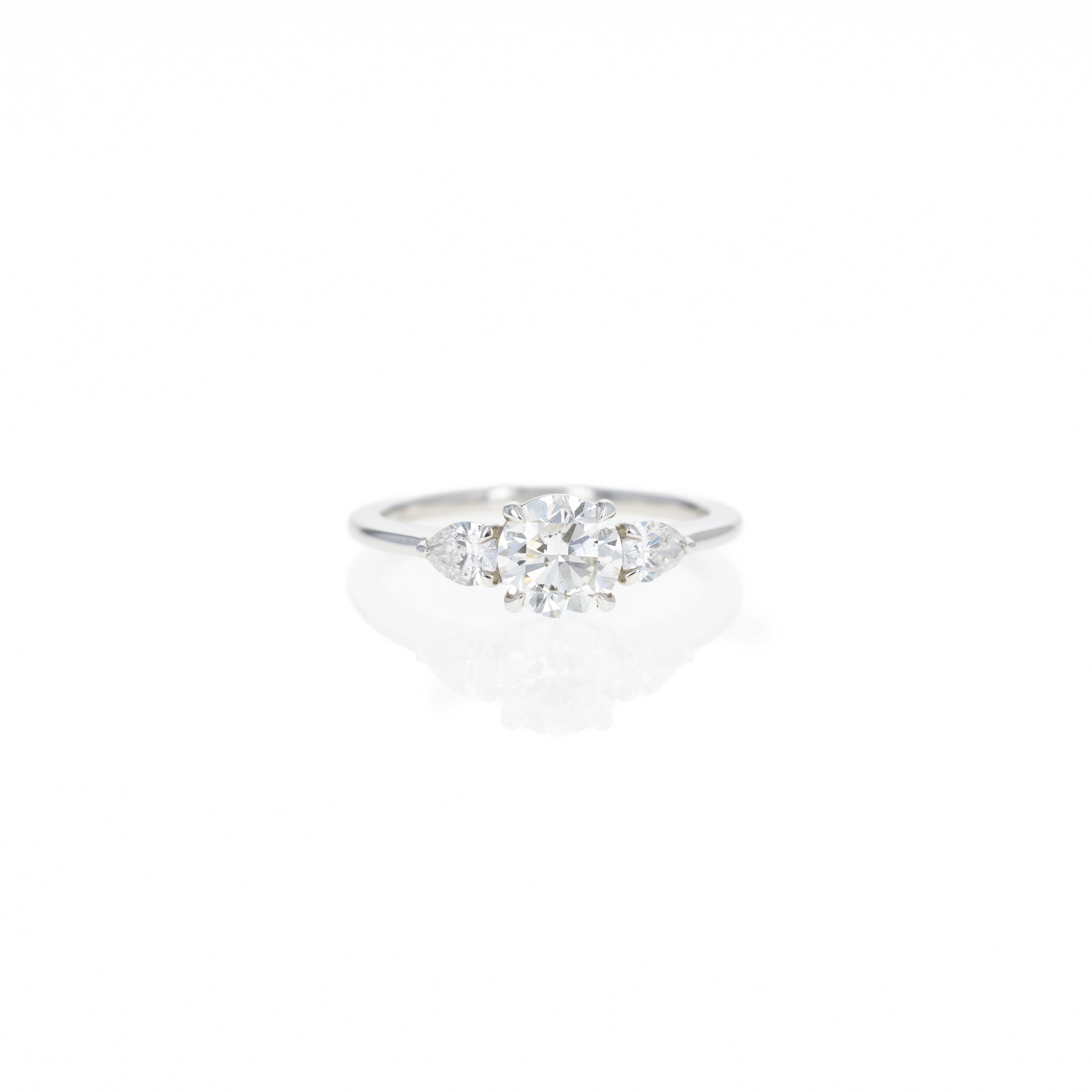 1.04 Carat Round Brilliant Diamond Three Stone Pear Accent Engagement Ring in Platinum - Queen May