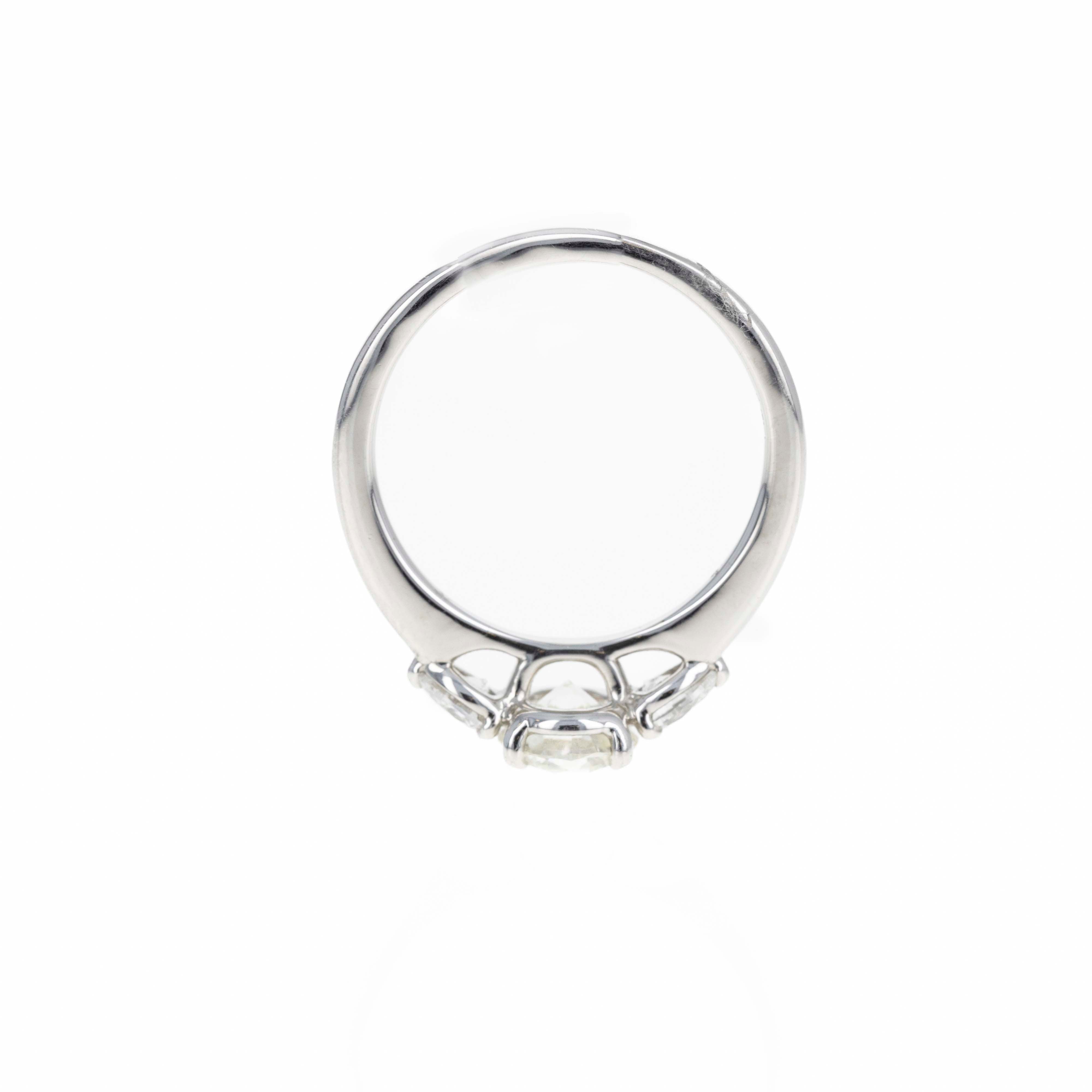 1.04 Carat Round Brilliant Diamond Three Stone Pear Accent Engagement Ring in Platinum - Queen May