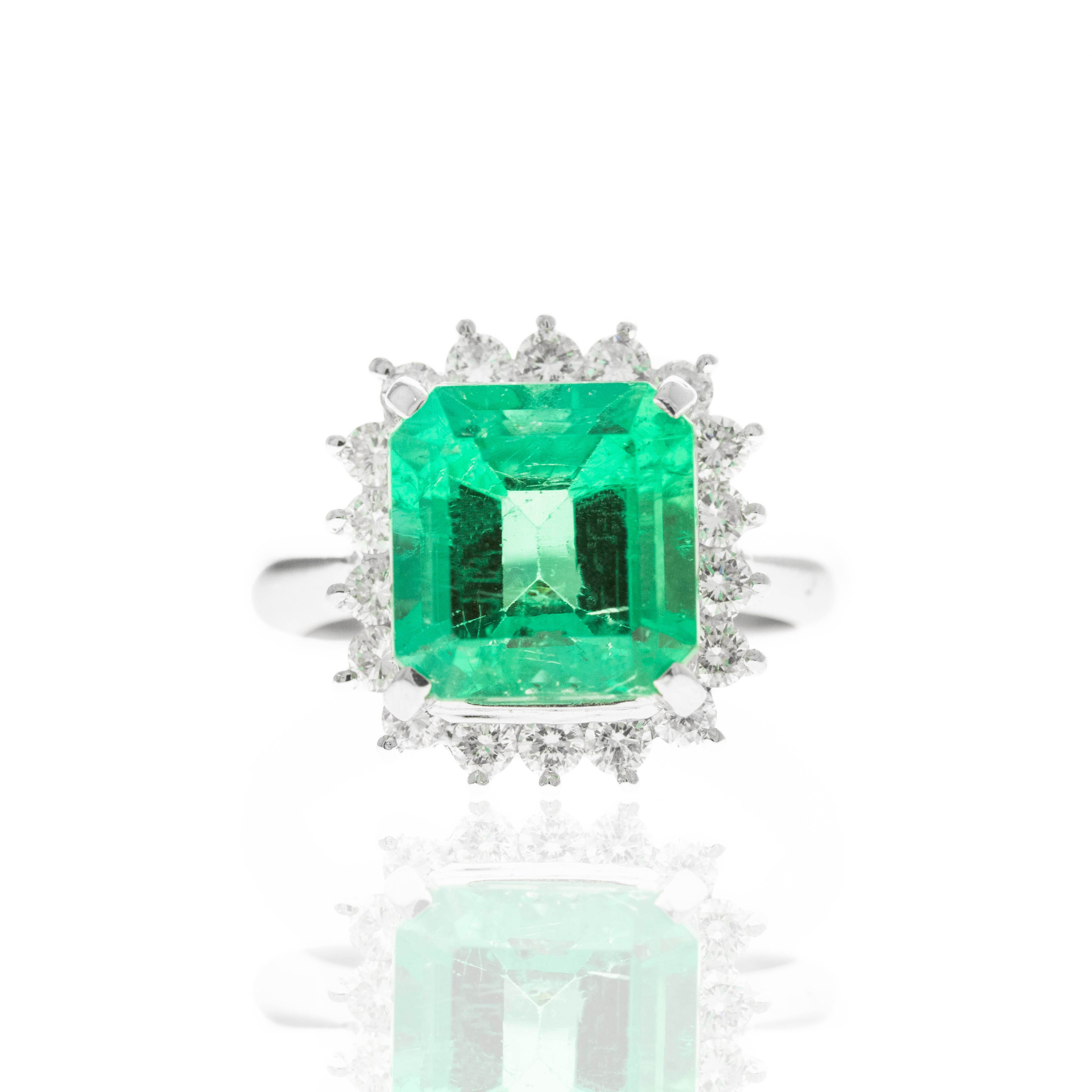 Platinum 3.74 Carat Columbian Emerald Diamond Halo Ring