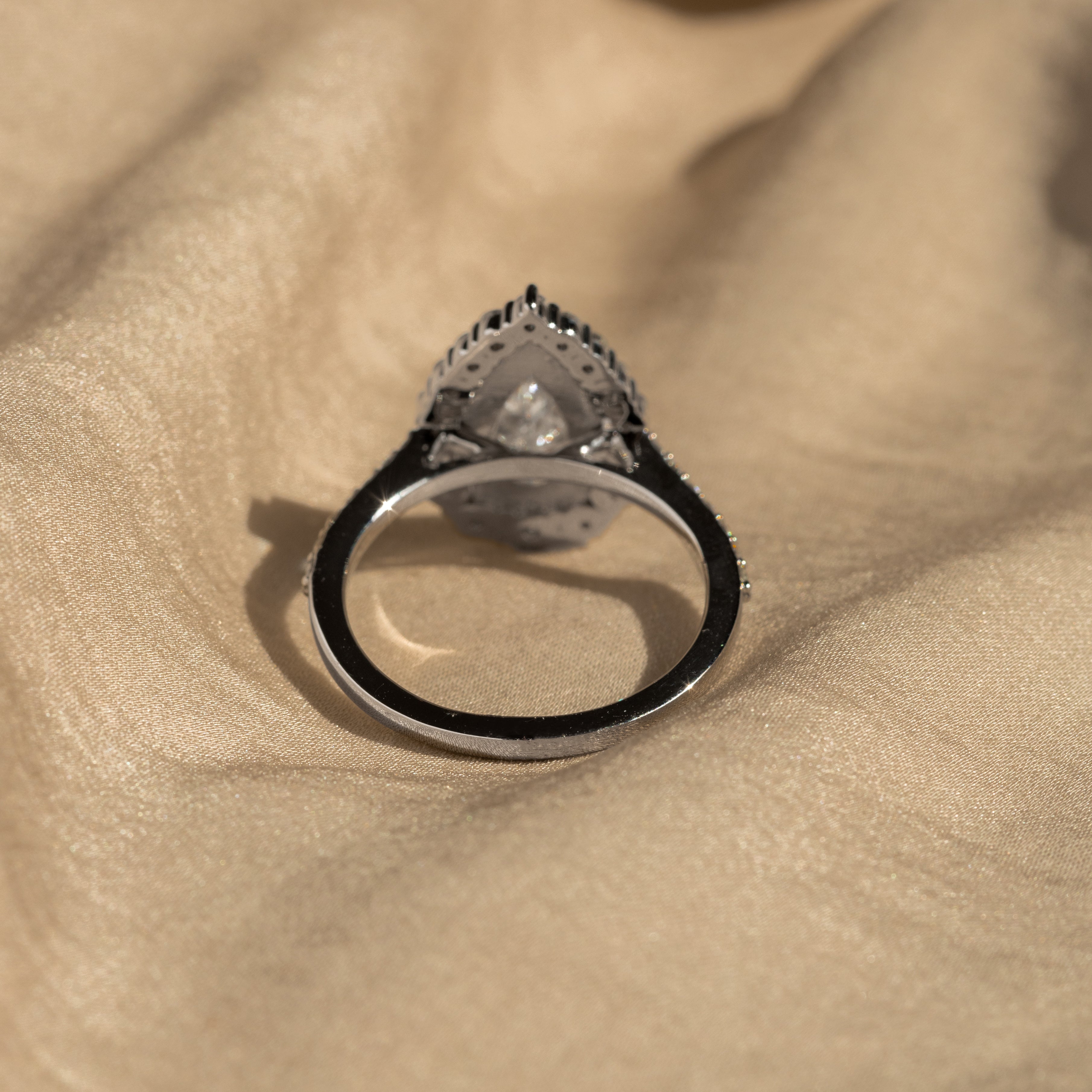 2.24 Carat Pear Diamond Graduated Halo Engagement Ring - Queen May