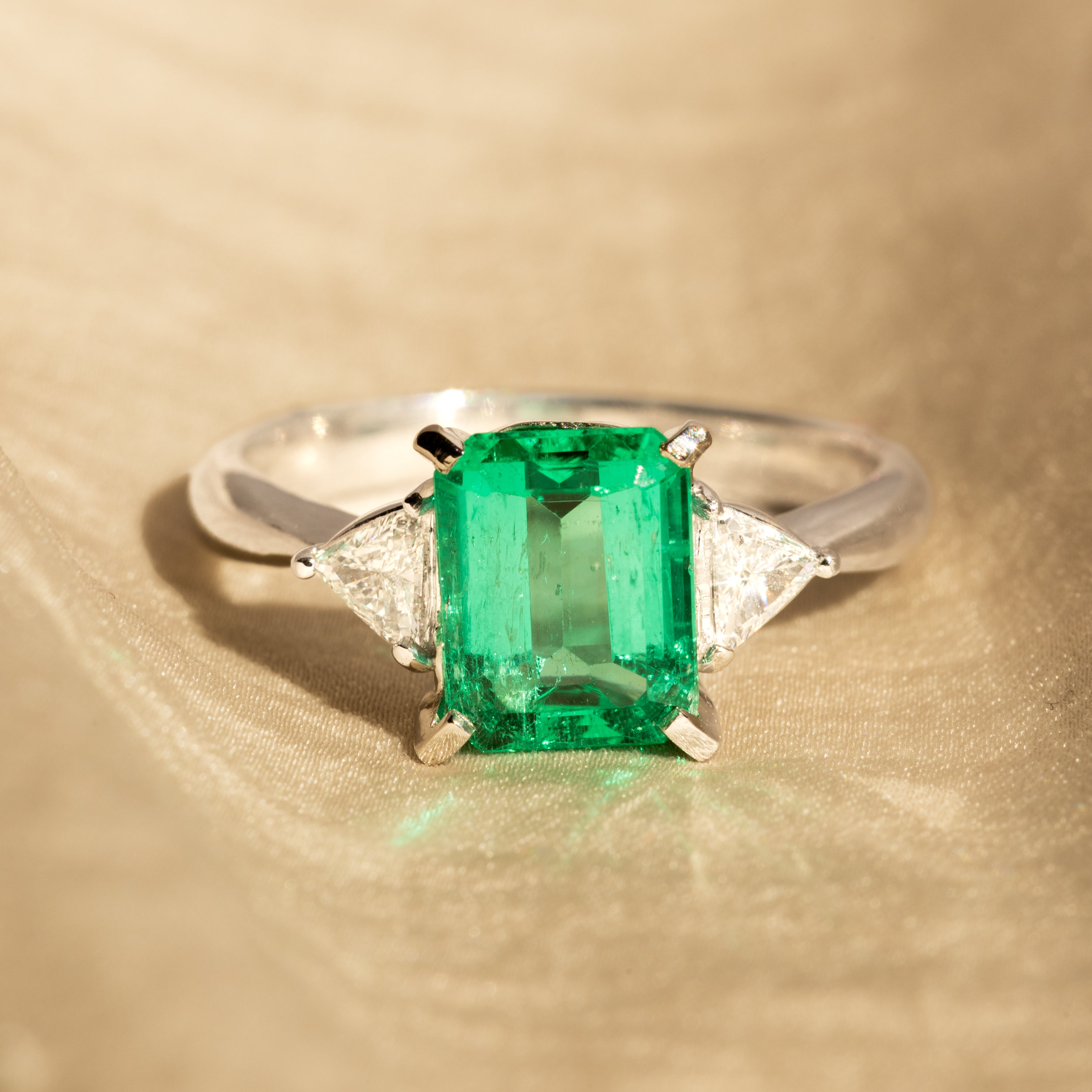 2.07 Carat Natural Emerald Trillion Diamond Three Stone Ring - Queen May
