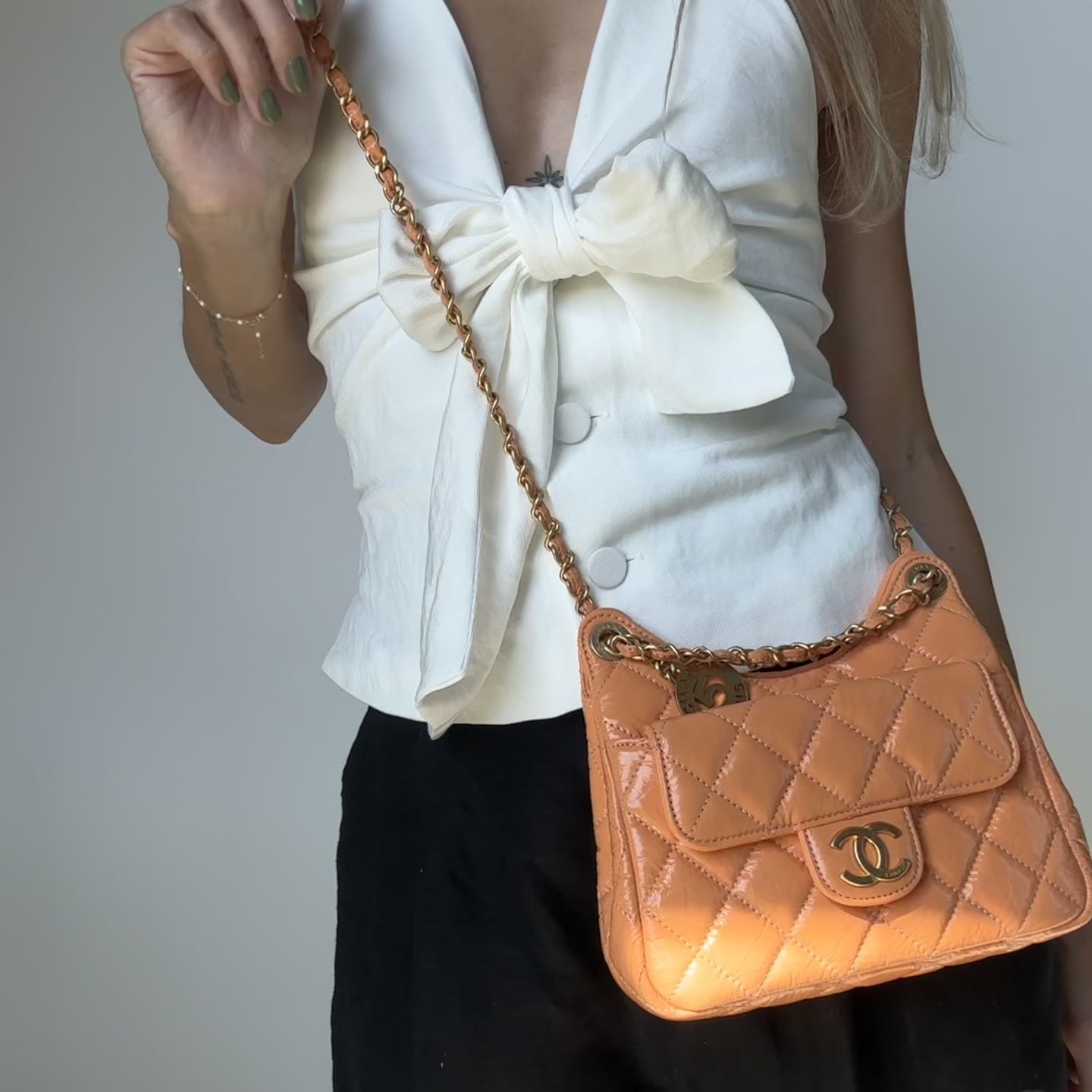 Chanel Orange Shiny Crumpled Quilted Leather Small Wavy CC Hobo 2023 - Queen May