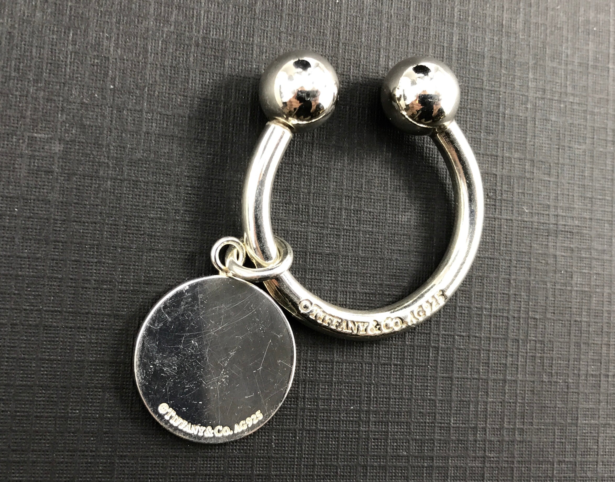 Tiffany & Co Sterling Silver Circle Tag "L" Key Ring - Queen May