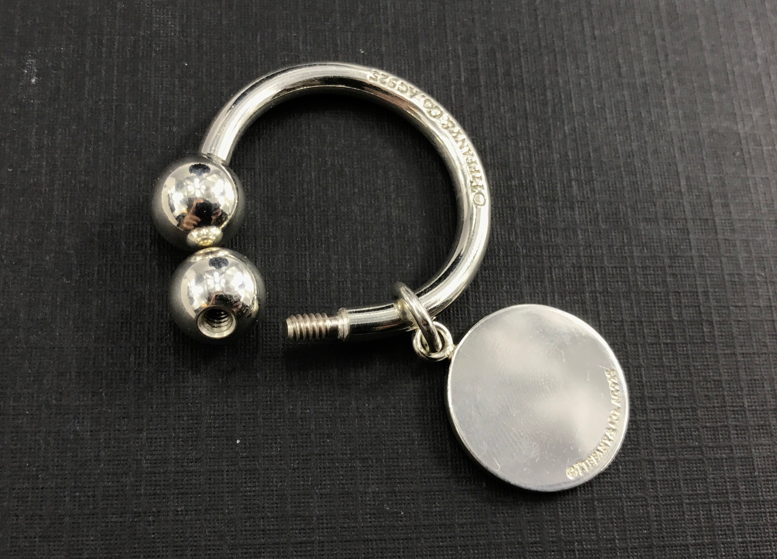 Tiffany & Co Sterling Silver Circle Tag "L" Key Ring - Queen May