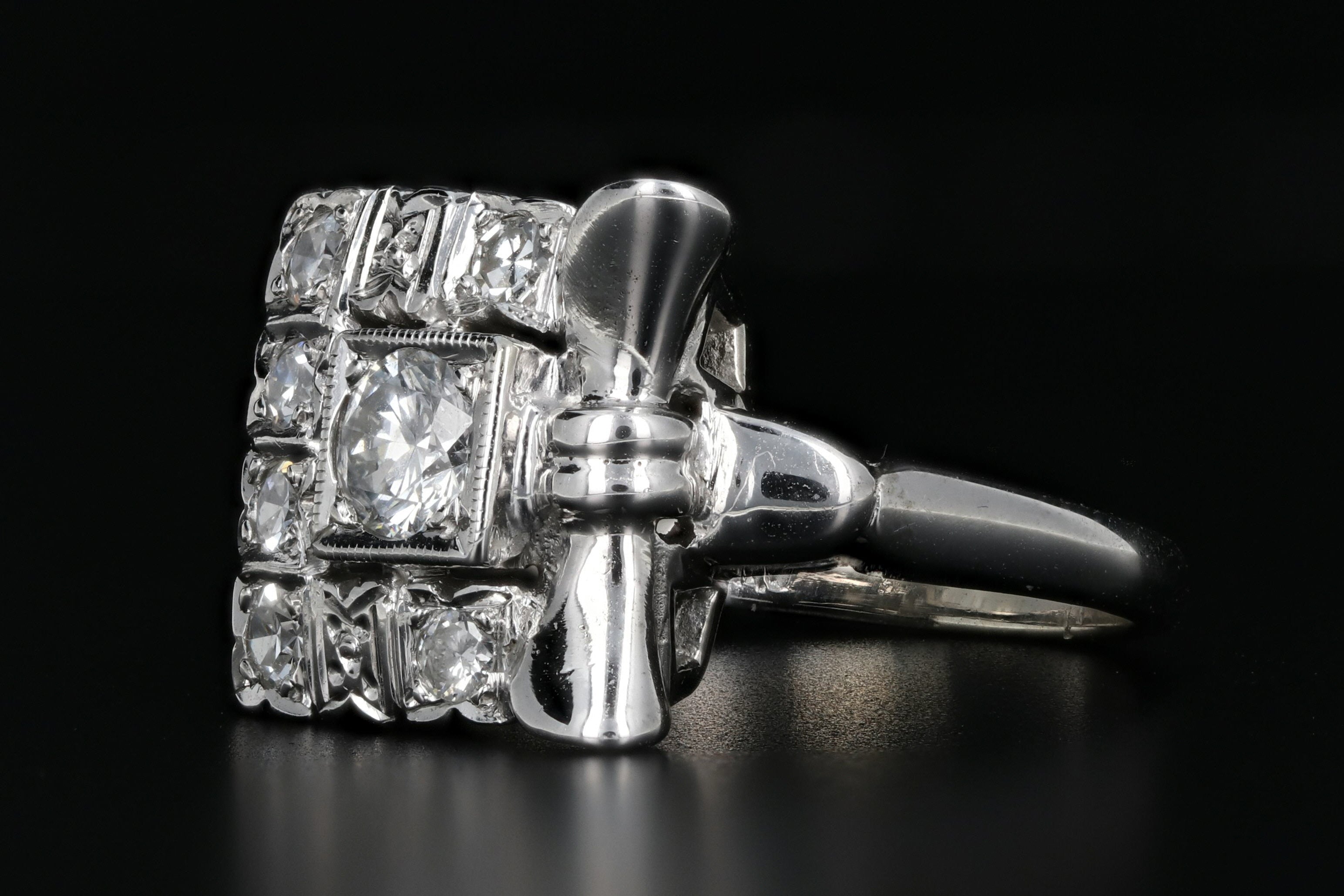 14K White Gold .25 CTR Diamond with .45 CTW Diamond Bow Ring - Queen May