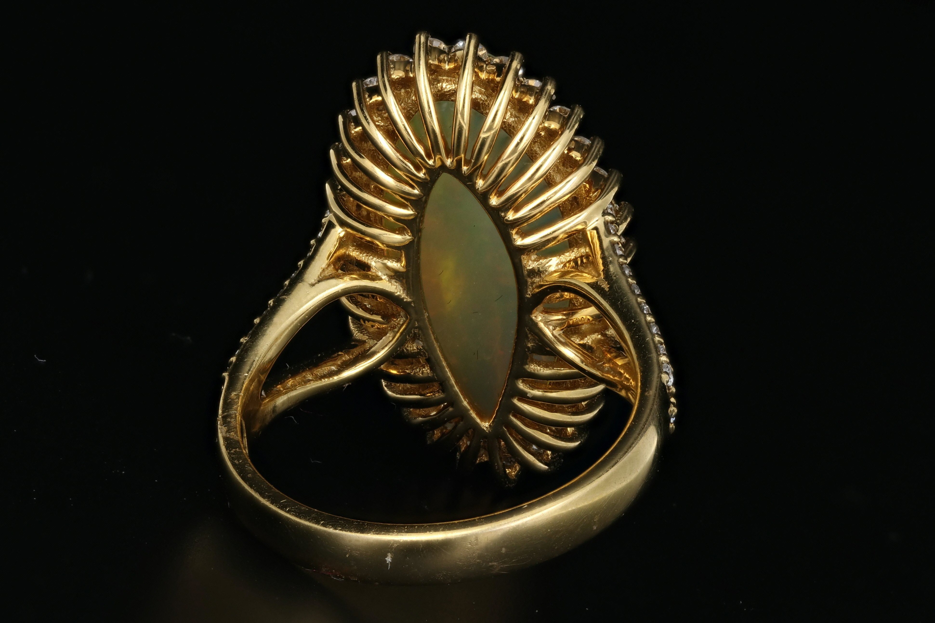 14K Yellow Gold 8.5 CT Ethiopian Opal with .75CTW Diamond Halo Ring - Queen May