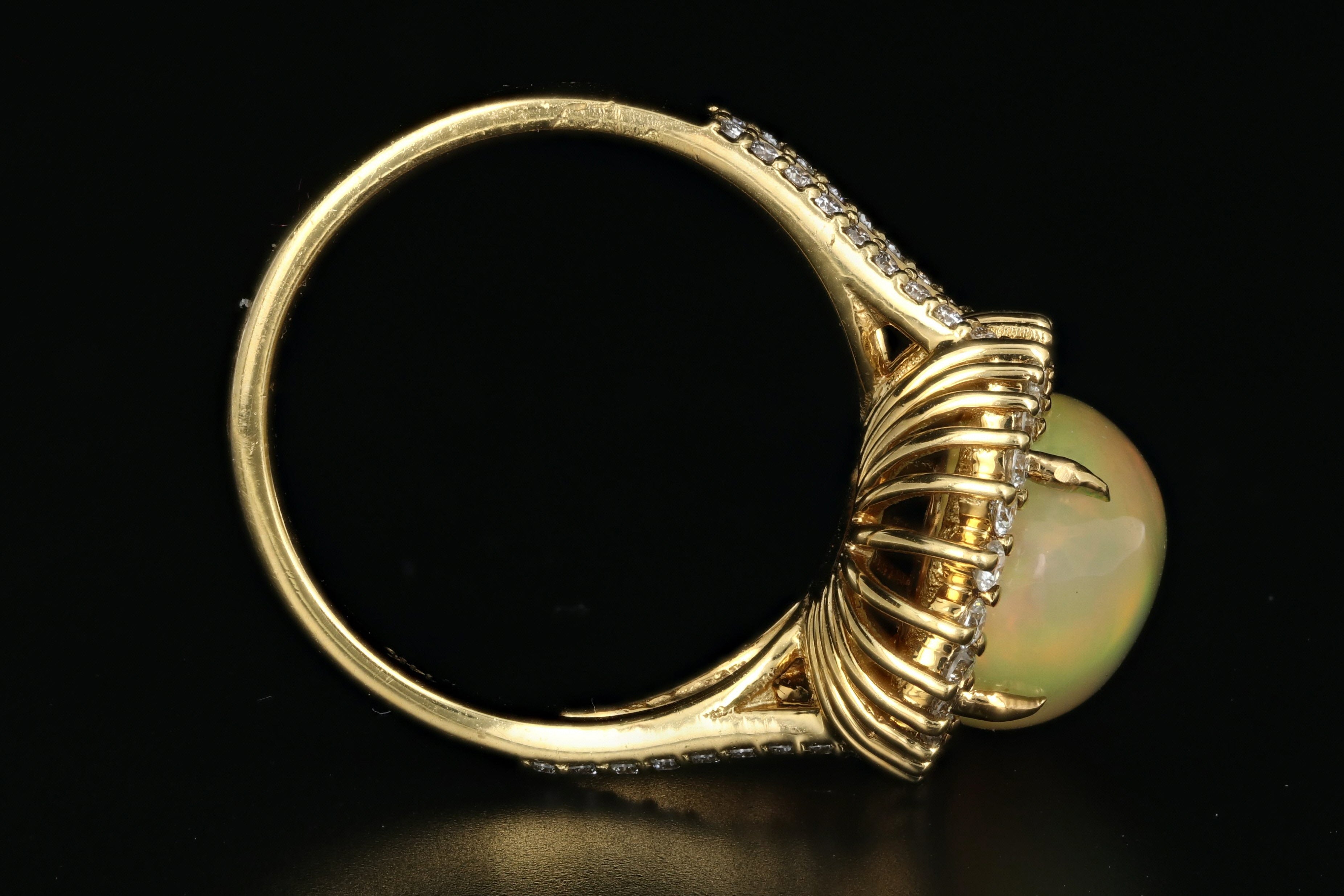 14K Yellow Gold 8.5 CT Ethiopian Opal with .75CTW Diamond Halo Ring - Queen May