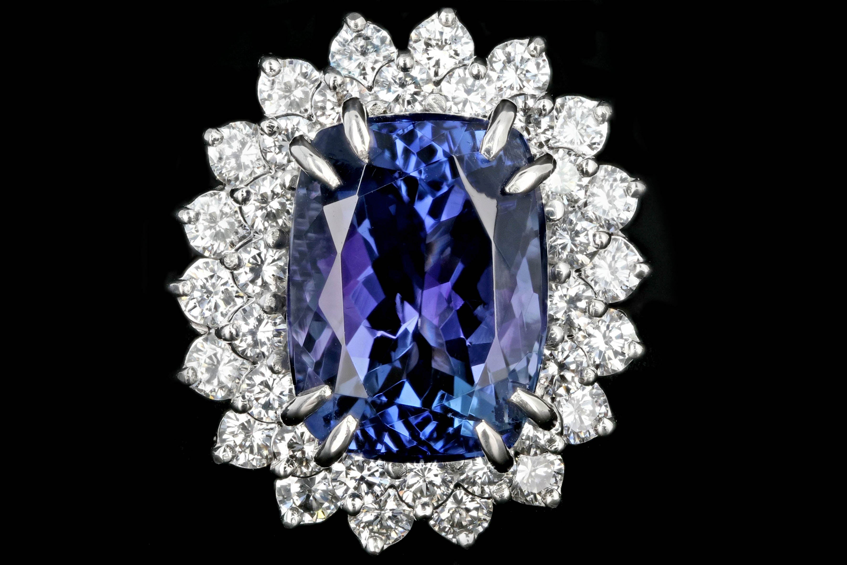 Modern Platinum 9.51 Tanzanite and Diamond Halo Ring - Queen May