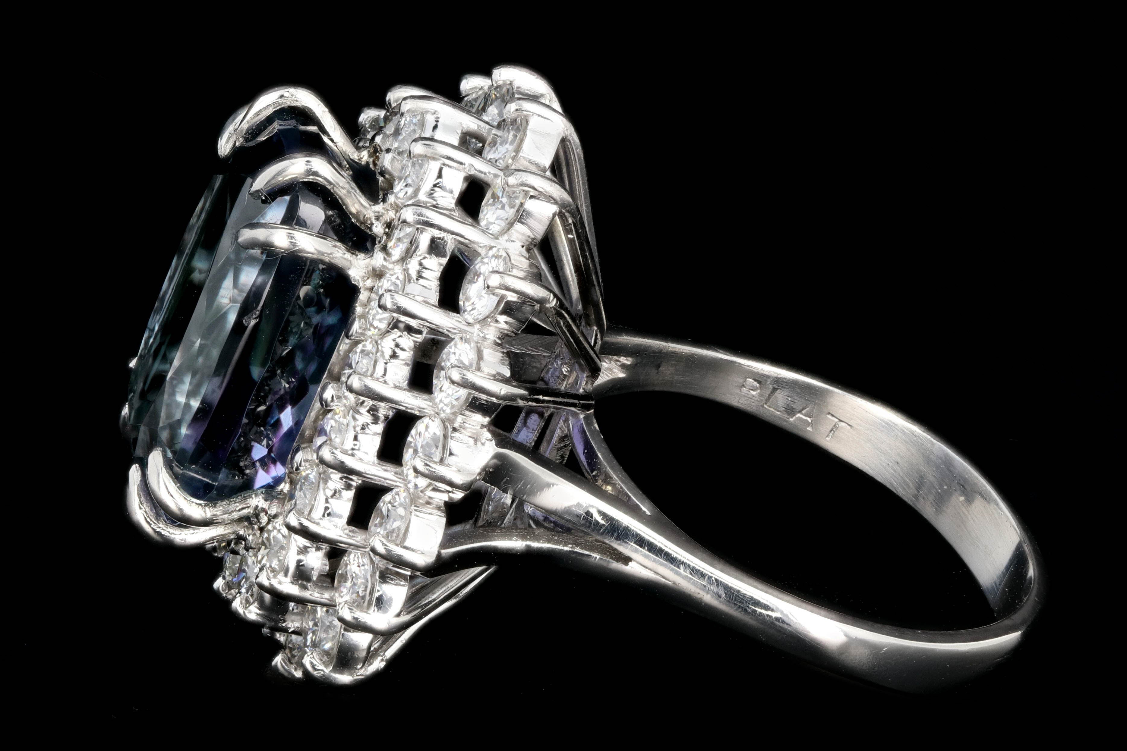 Modern Platinum 9.51 Tanzanite and Diamond Halo Ring - Queen May