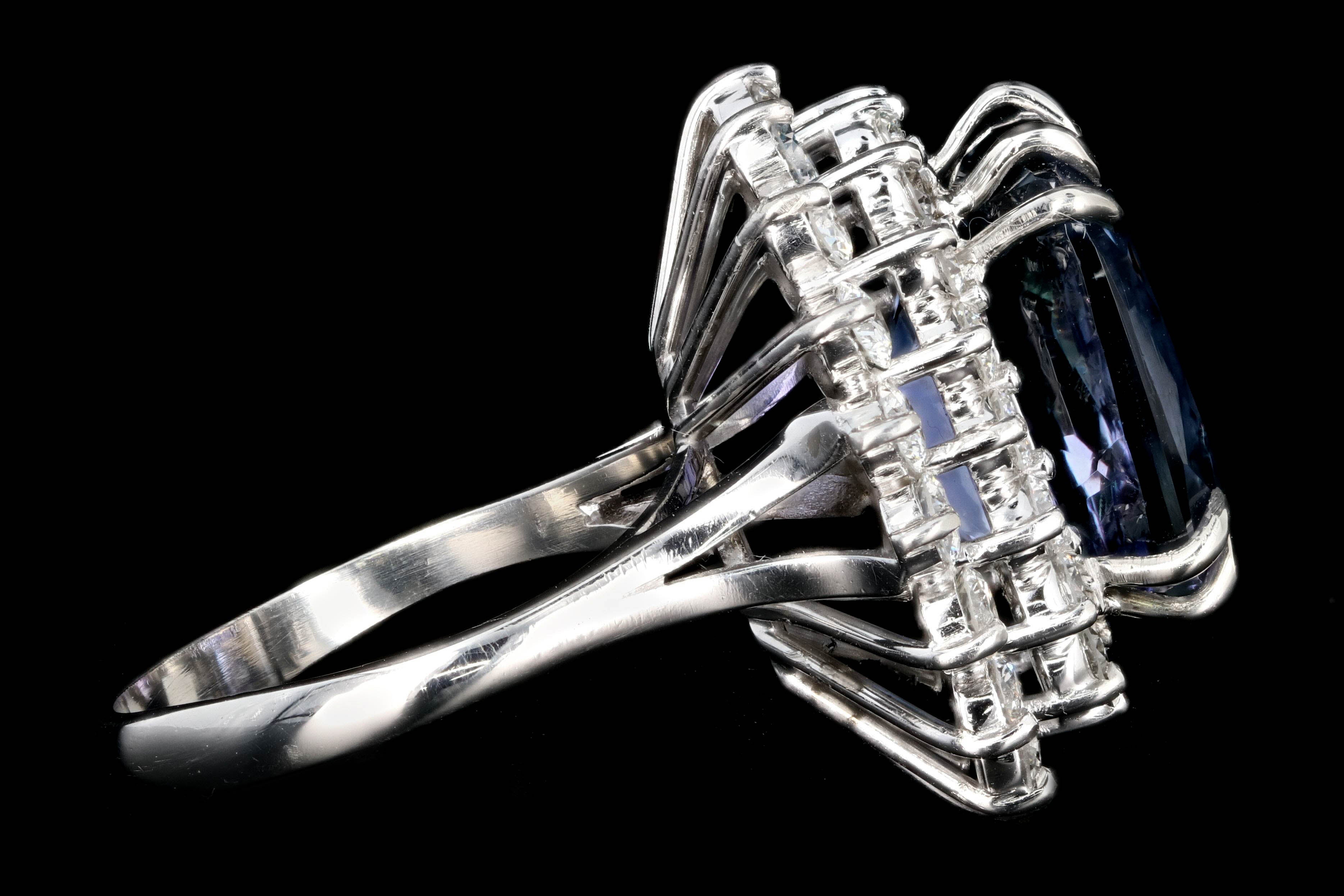 Modern Platinum 9.51 Tanzanite and Diamond Halo Ring - Queen May