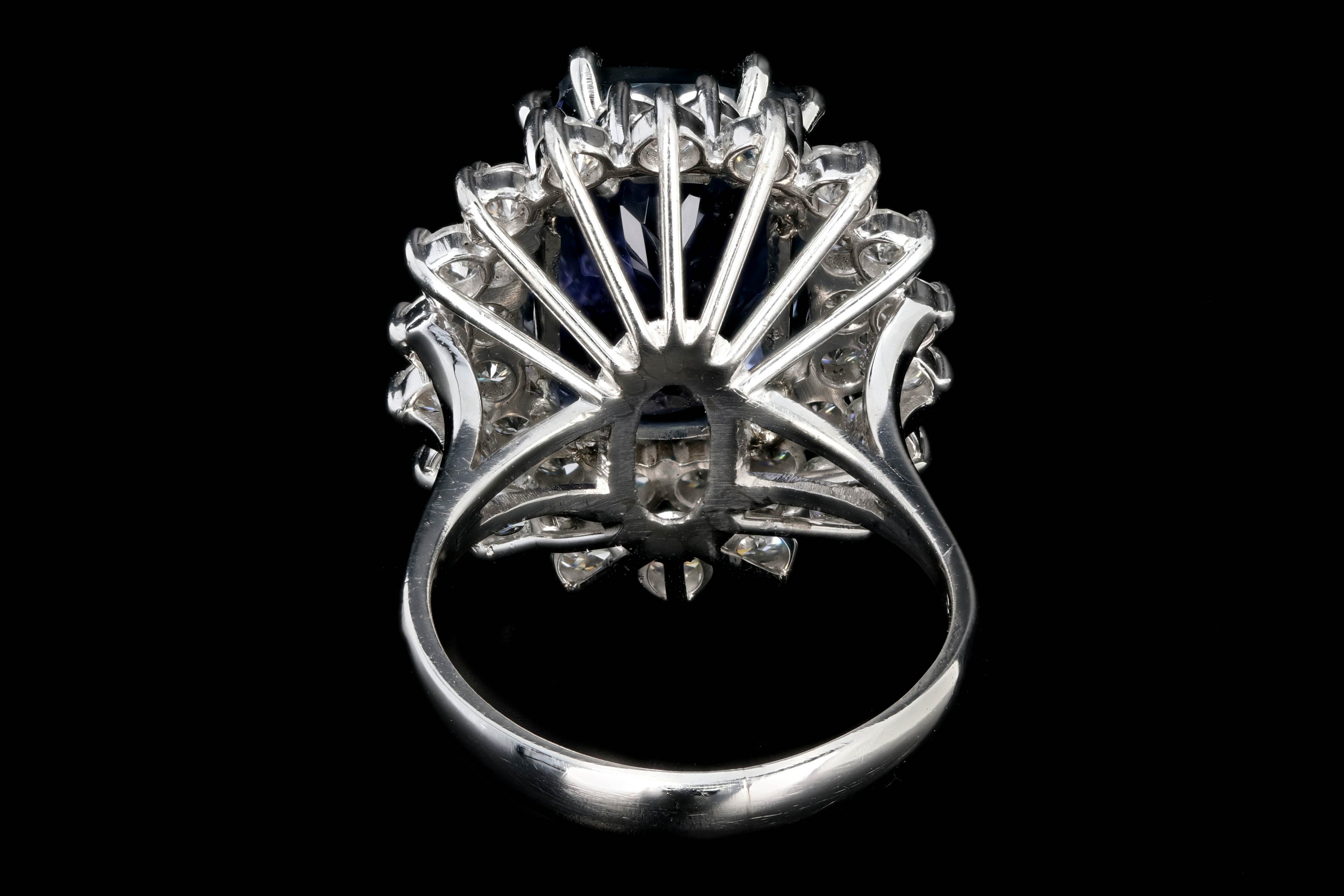 Modern Platinum 9.51 Tanzanite and Diamond Halo Ring - Queen May