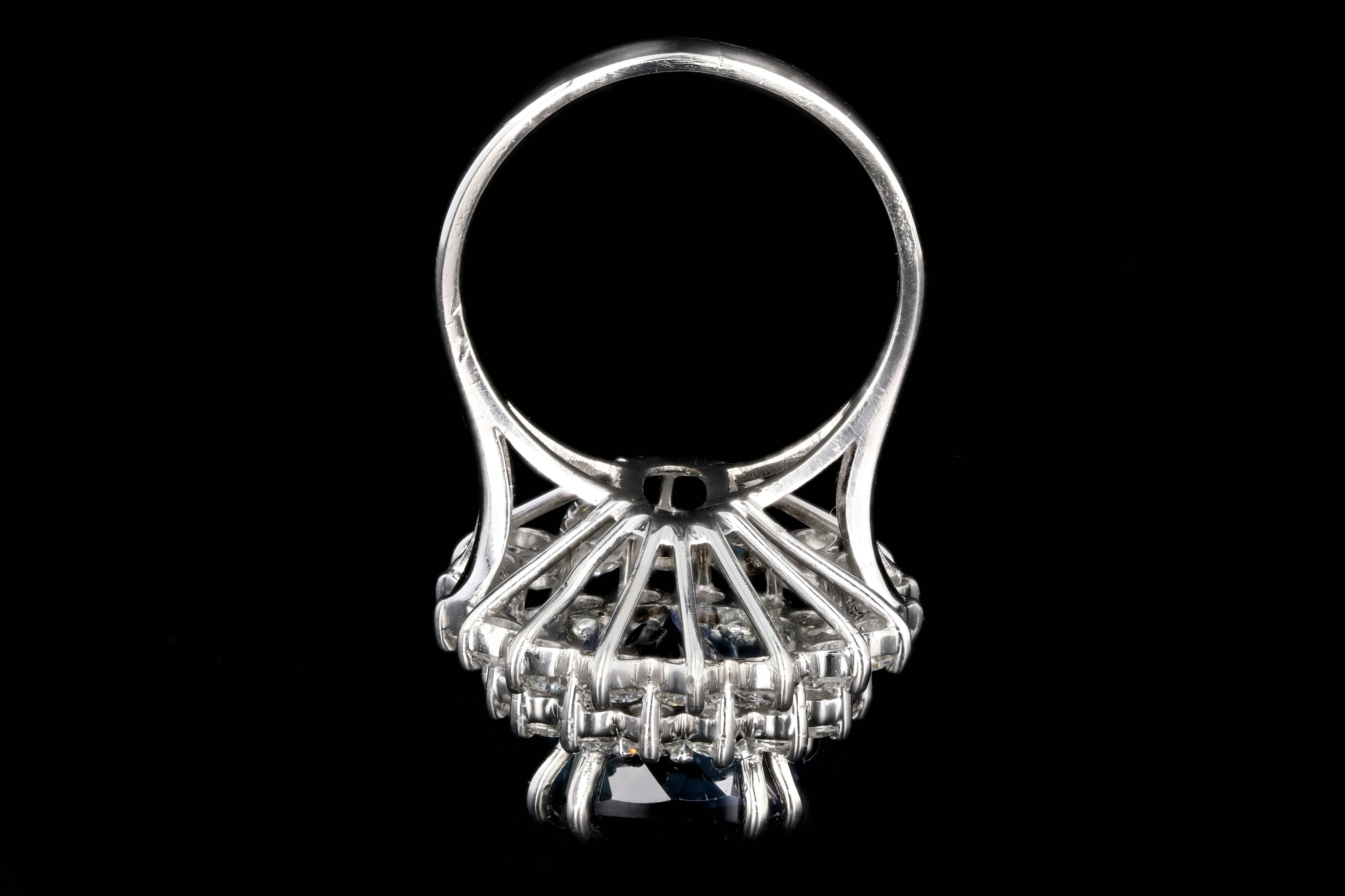 Modern Platinum 9.51 Tanzanite and Diamond Halo Ring - Queen May