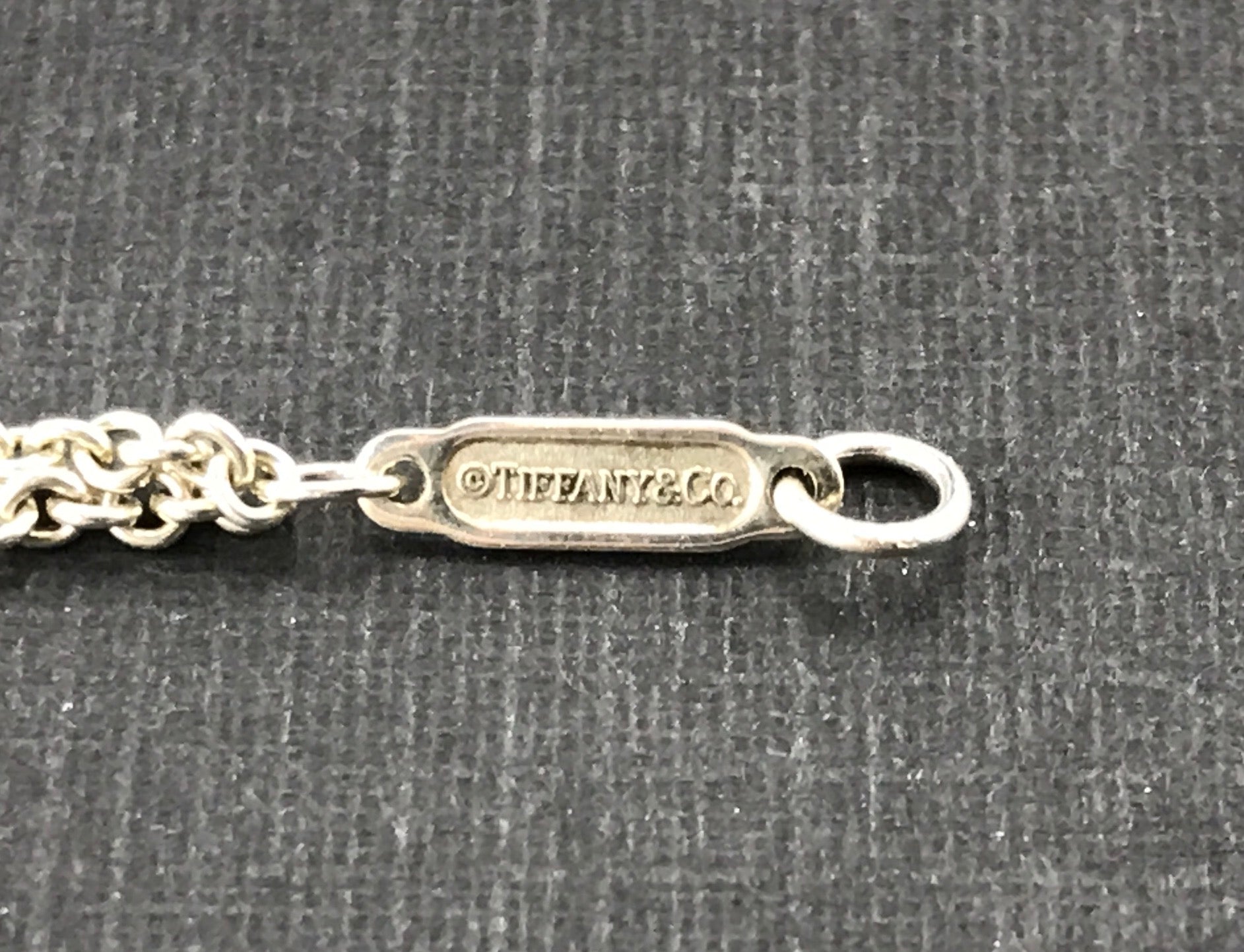 Tiffany & Co Sterling Silver Infinity Bracelet 6.5" - Queen May