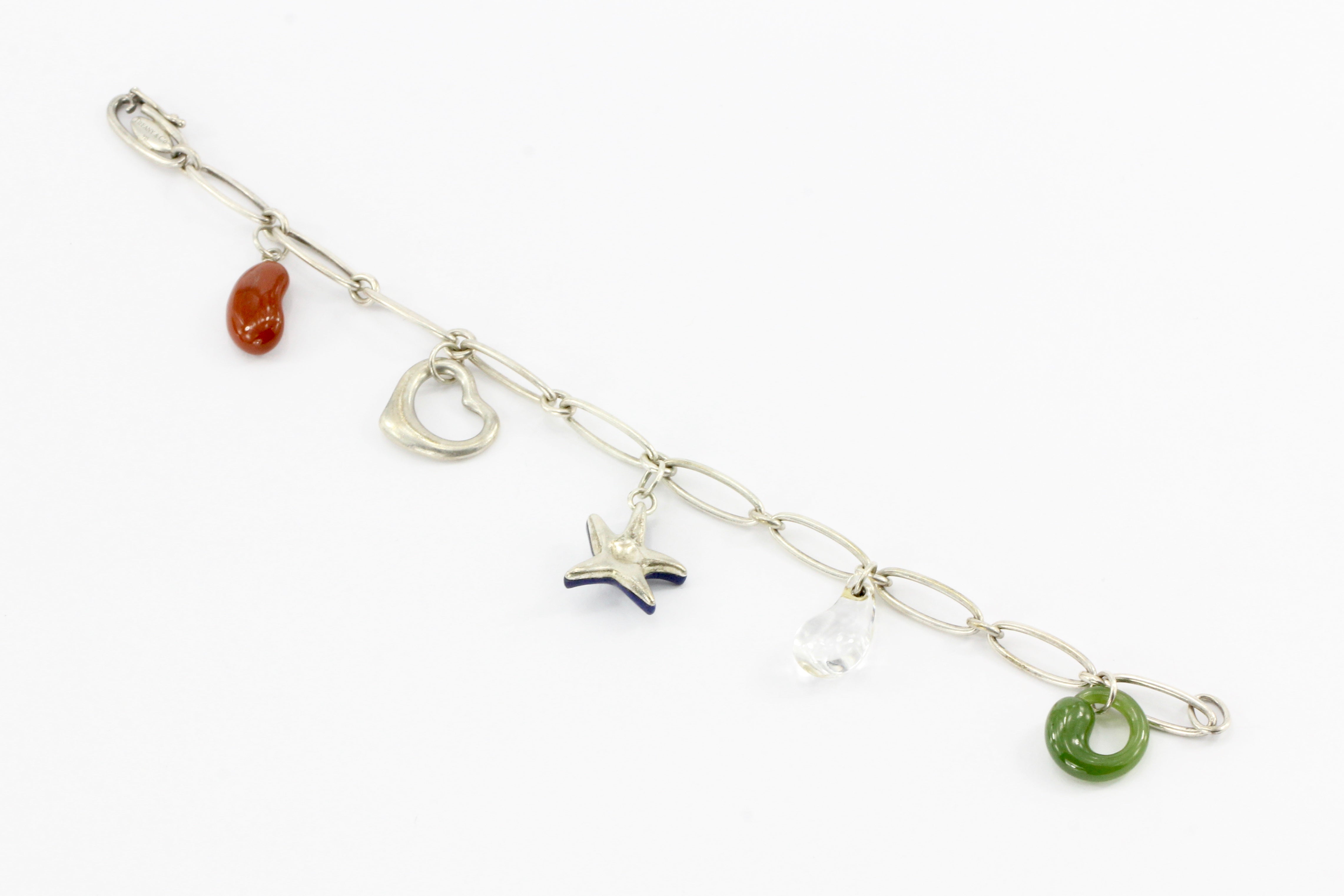 Tiffany & Co. Sterling Silver Multistage Five Charm Bracelet - Queen May