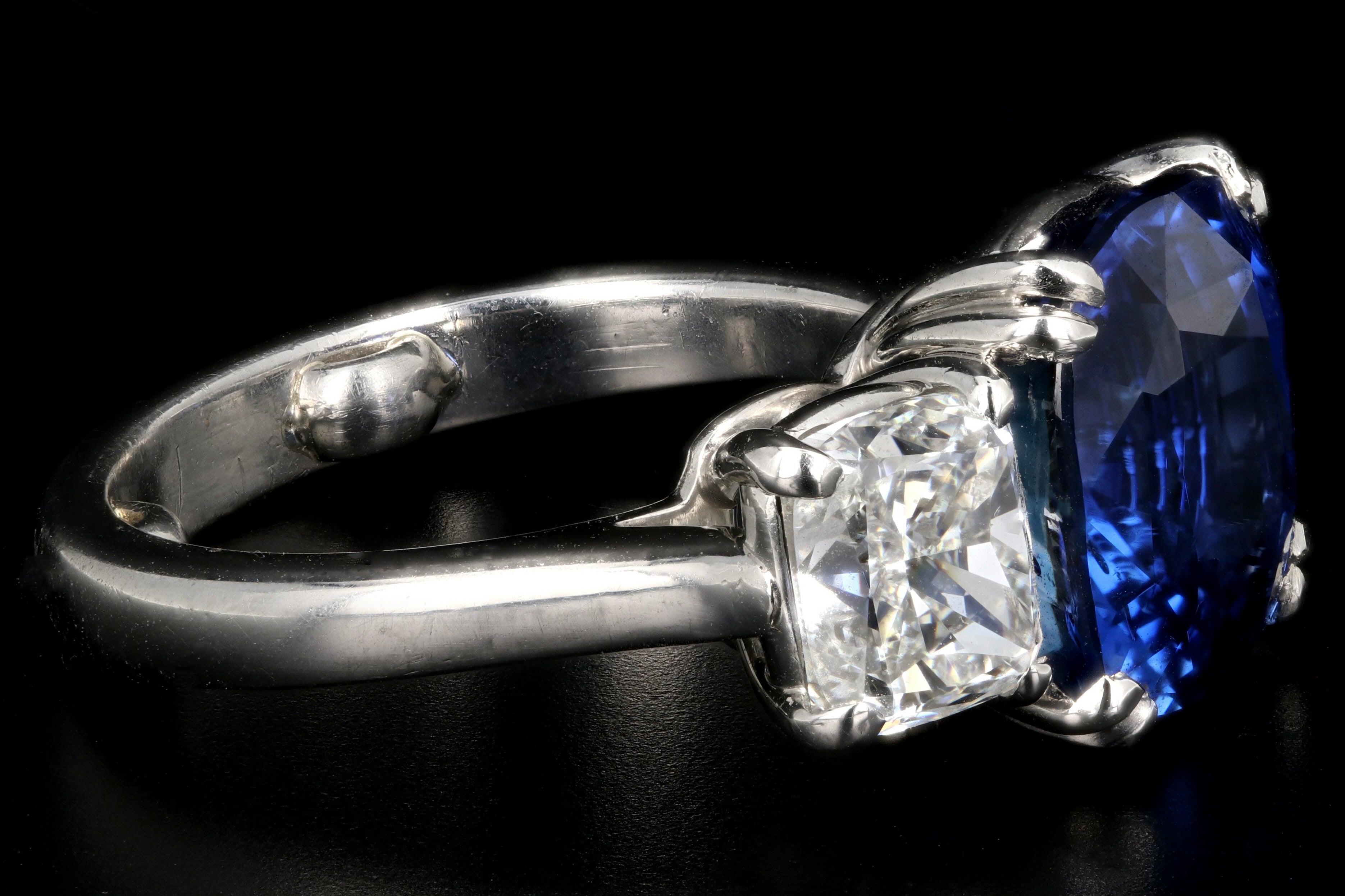 Platinum 7.2ct Madagascar Sapphire Flanked By Two 1.4ct G VS2 Diamonds - Queen May