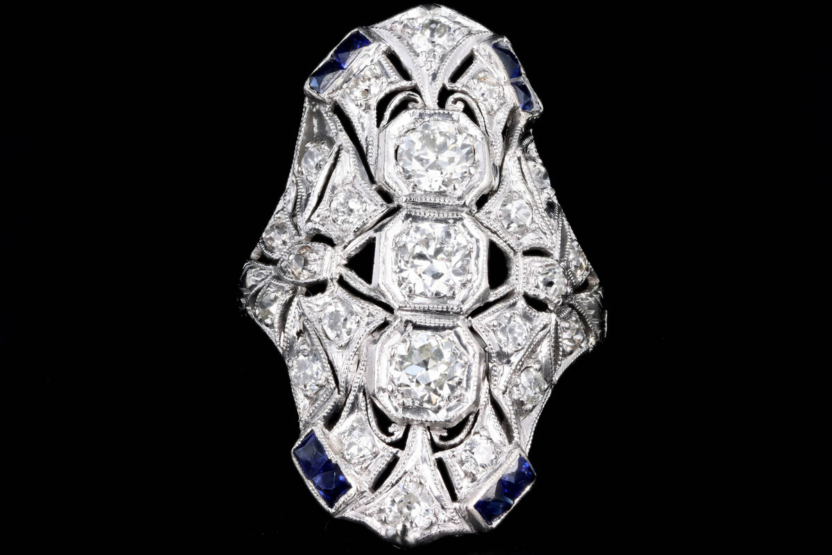 Art Deco Platinum Old European Cut Diamond Three Stone and French Cut Sapphire Hand Engraved Shield Ring - Queen May