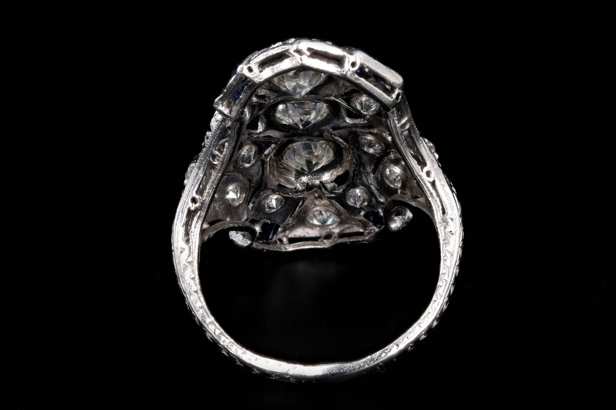 Art Deco Platinum Old European Cut Diamond Three Stone and French Cut Sapphire Hand Engraved Shield Ring - Queen May