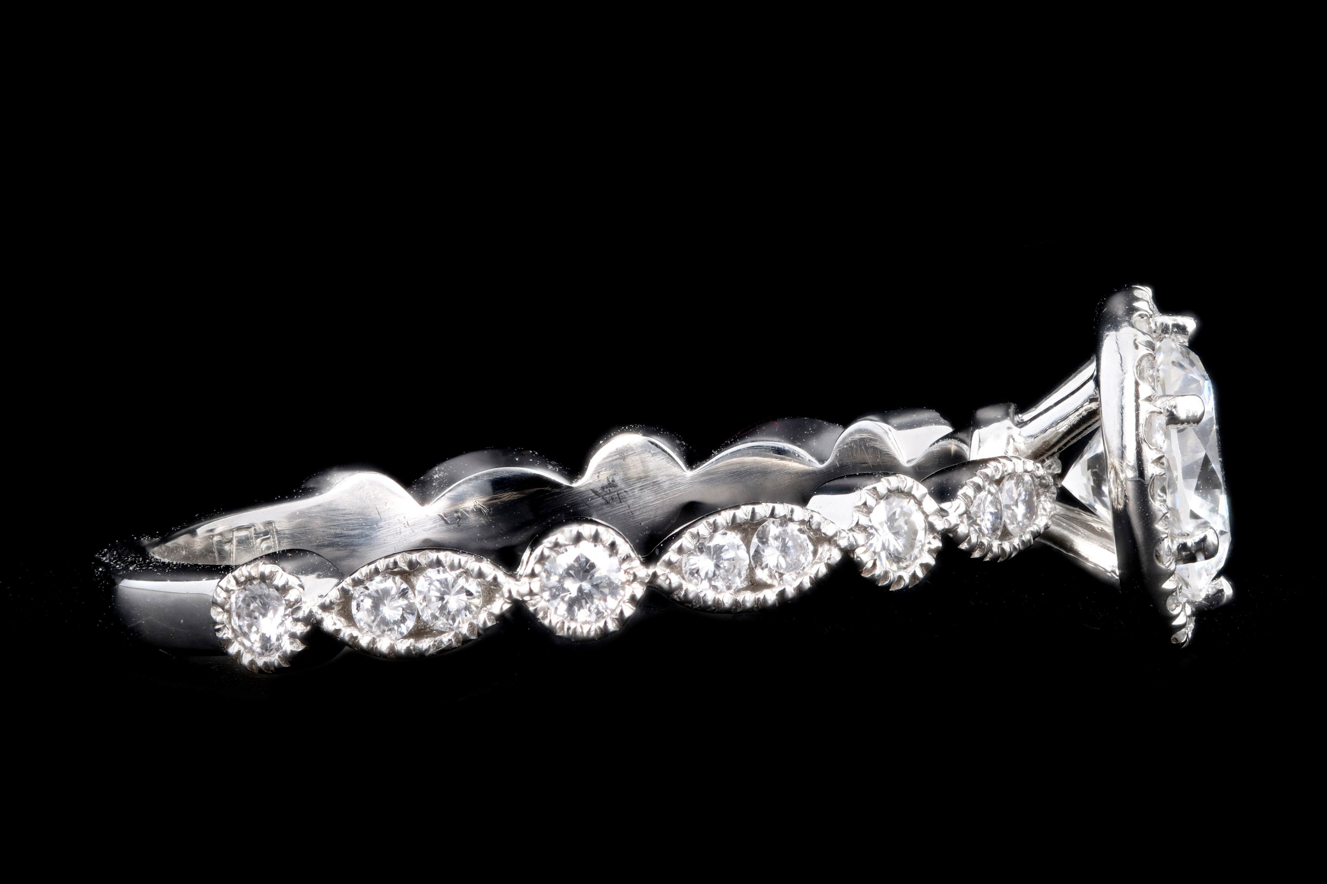 New Platinum .67 Carat Round Brilliant Diamond Halo Engagement Ring - Queen May