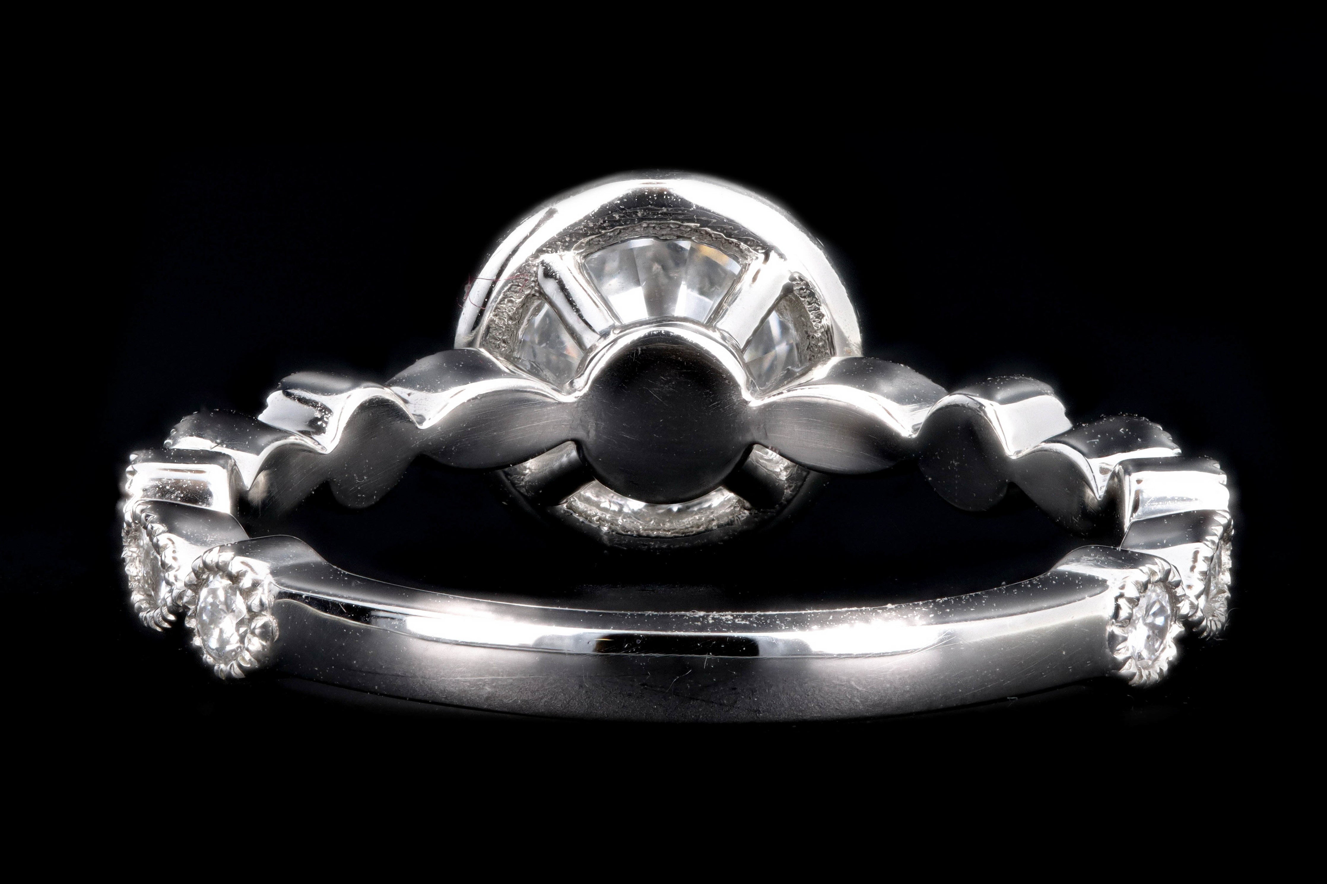 New Platinum .67 Carat Round Brilliant Diamond Halo Engagement Ring - Queen May