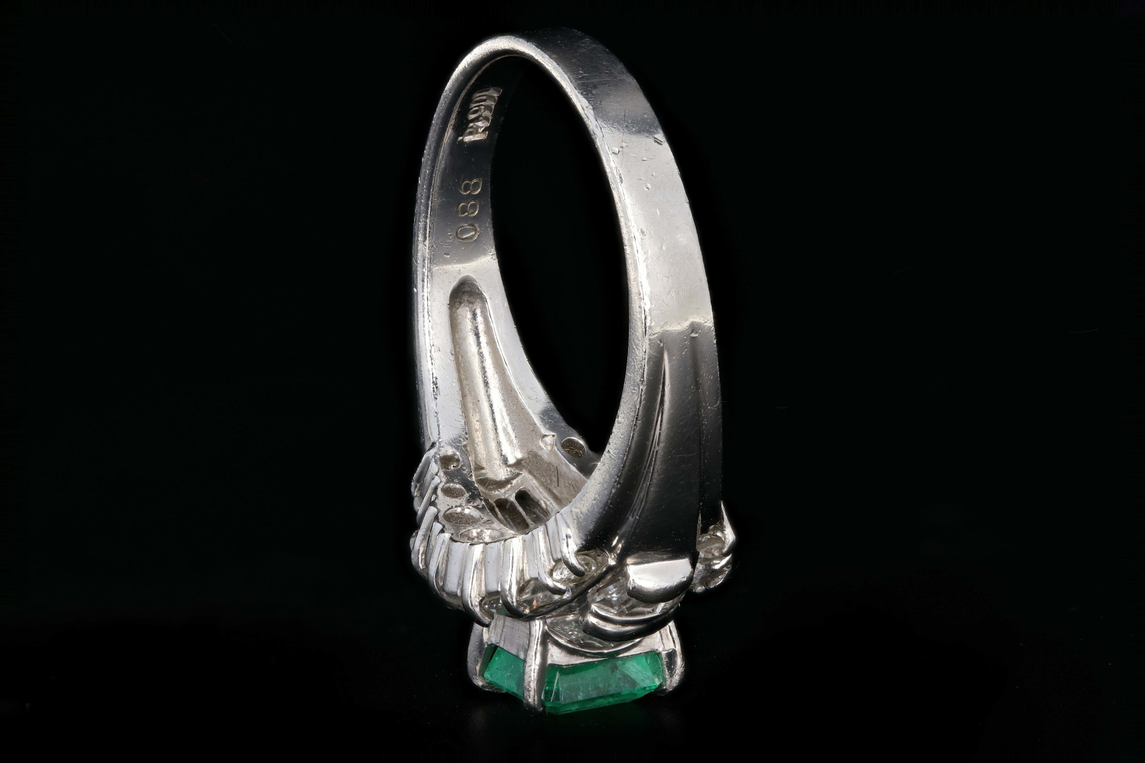 Retro Platinum .88 Carat Natural Emerald and Baguette Diamond Ring - Queen May
